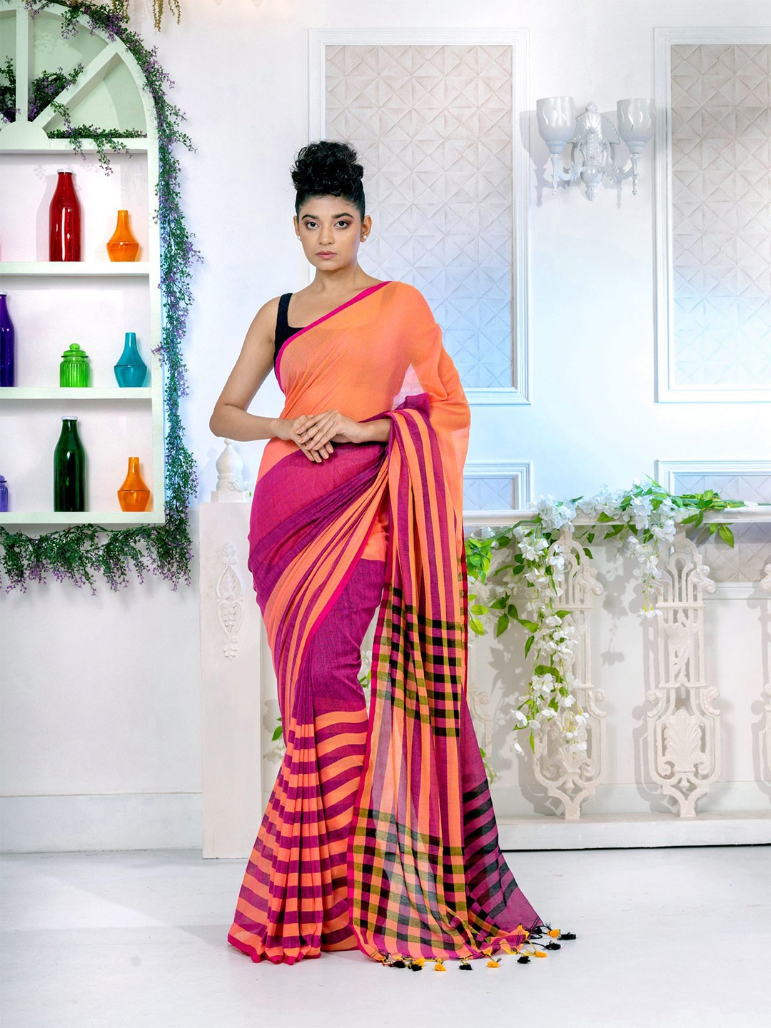 

Charukriti Women Peach Sarees