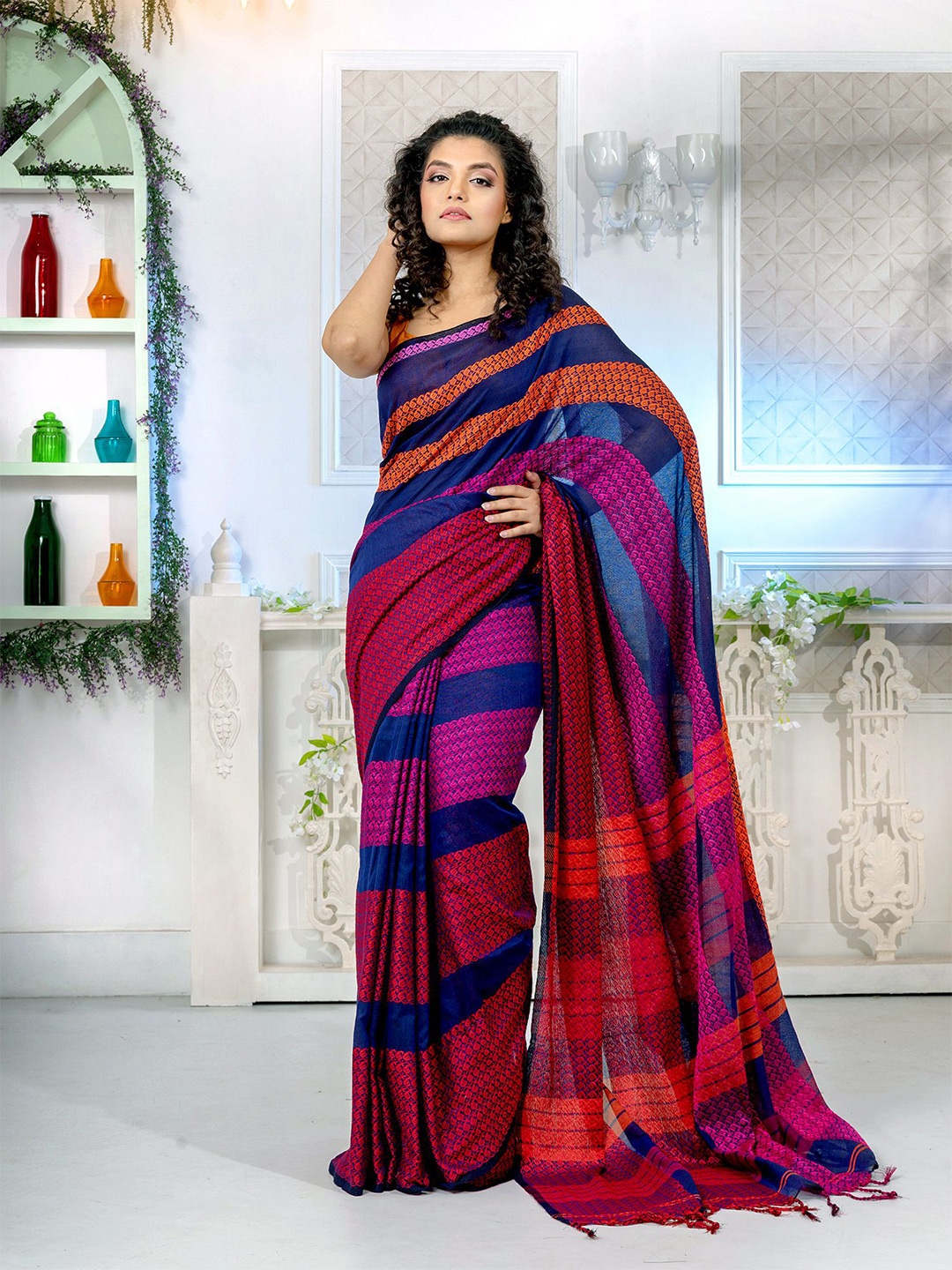 

Charukriti Women Blue Sarees