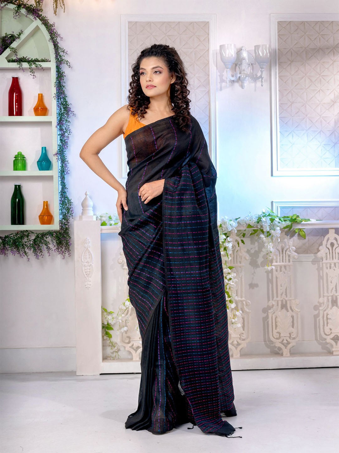 

Charukriti Women Black Sarees
