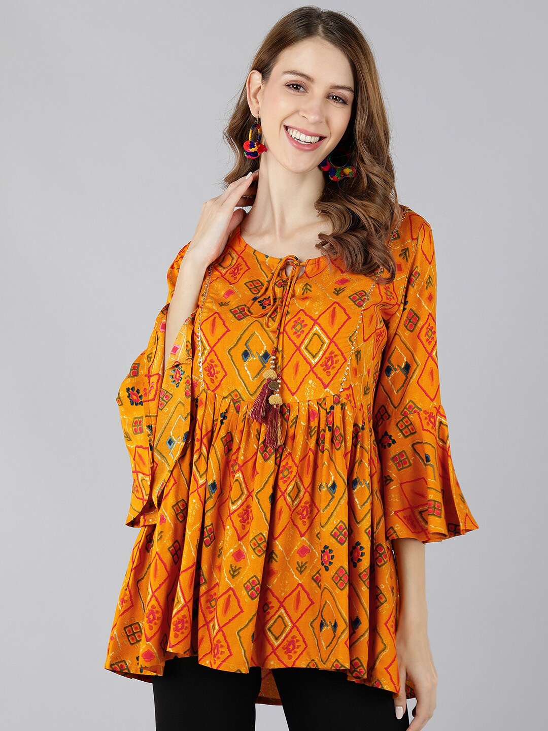 

kipek Women Mustard Yellow Printed Empire Top