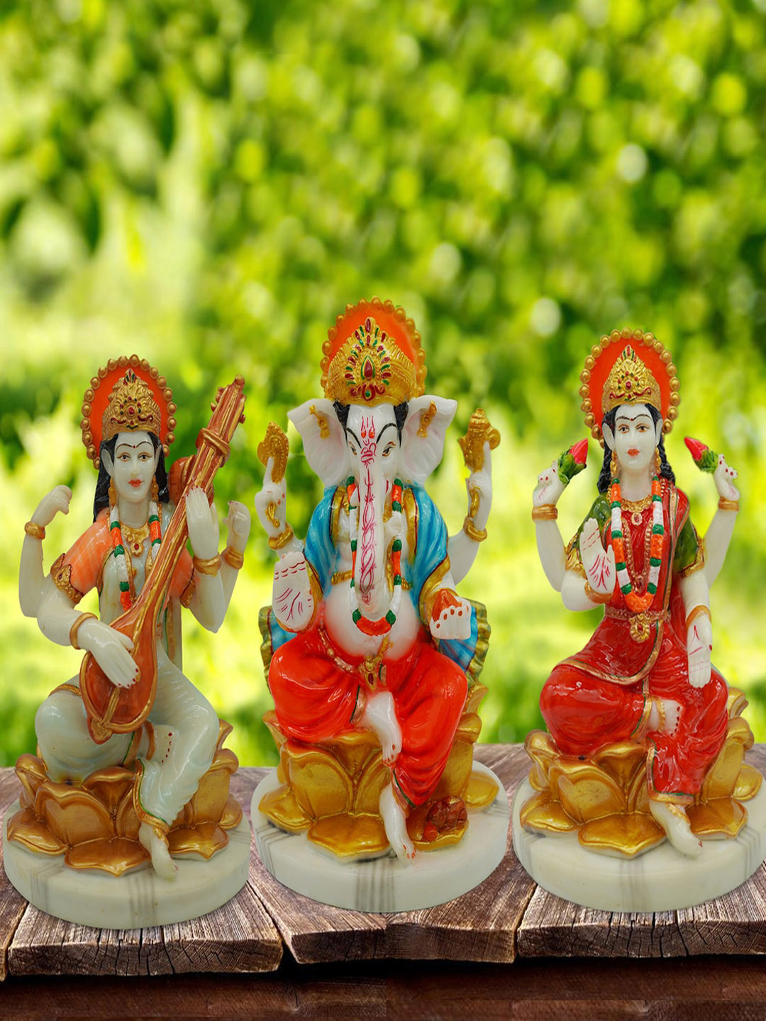 

Gallery99 Hand painted Laxmi, Ganesh & Sarasvati Idol For Pooja Room Decoration, Multi