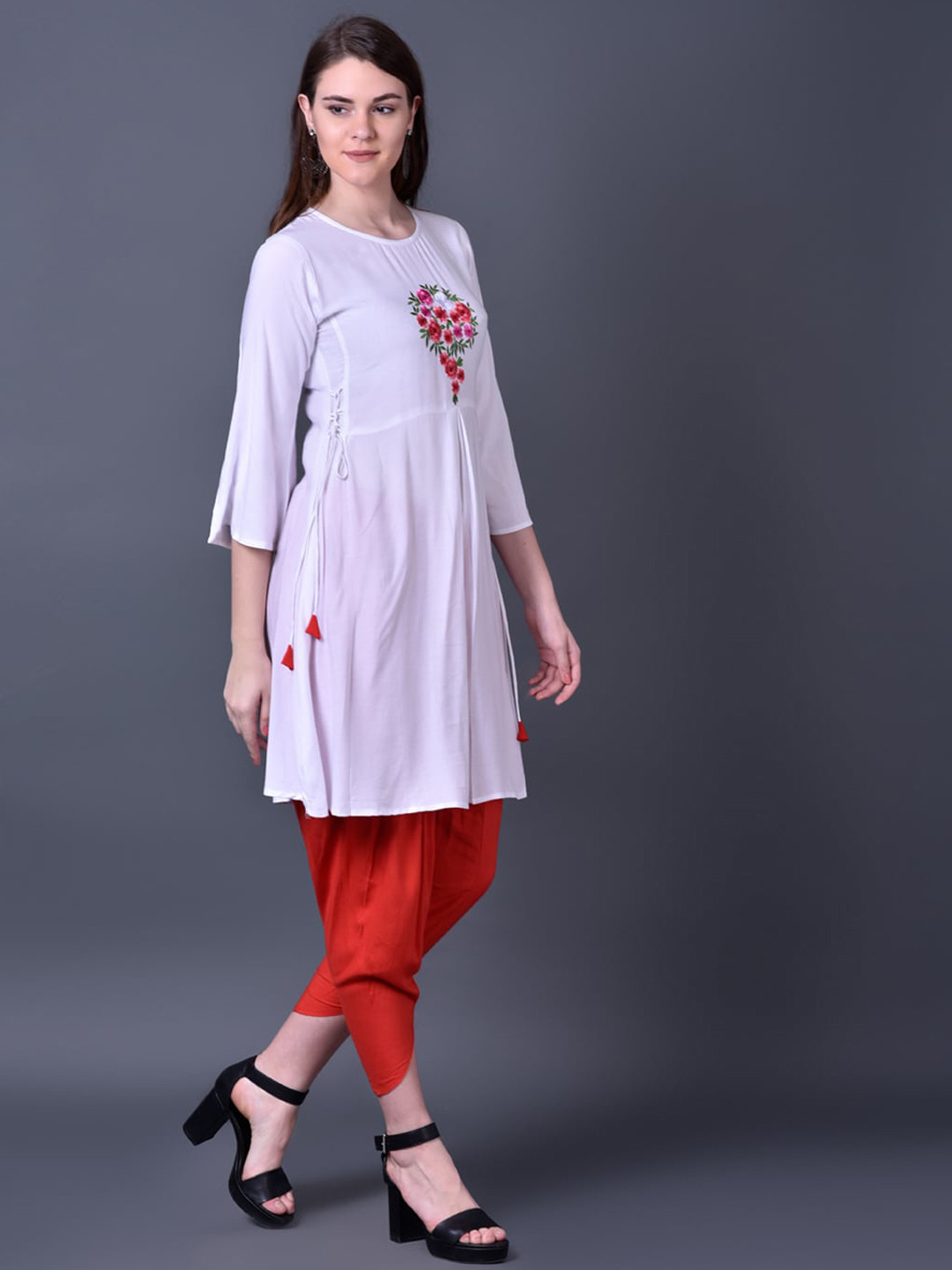 

Ziva Fashion Women White Floral Embroidered Empire Kurti with Trousers