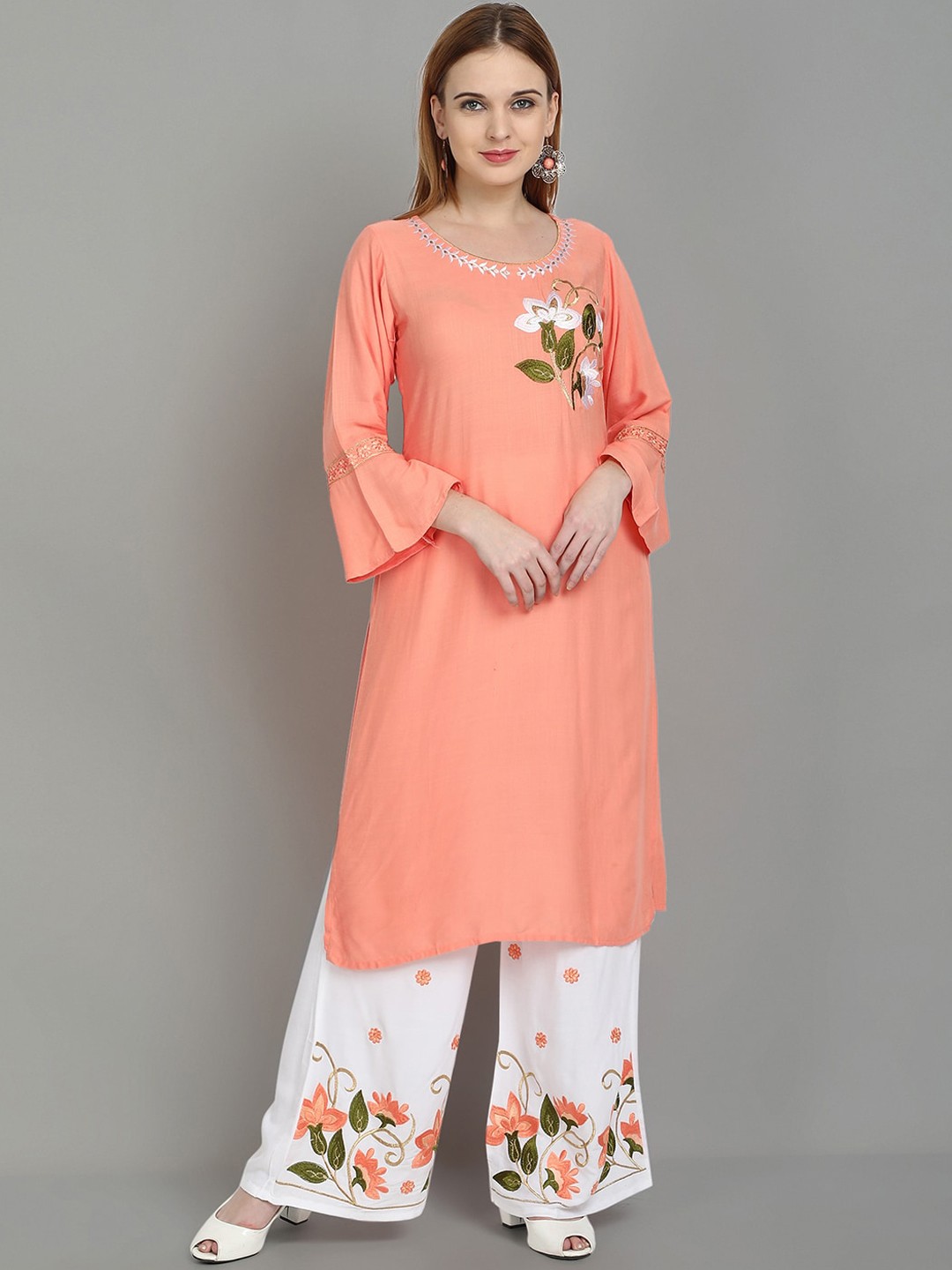 

Ziva Fashion Women Peach-Coloured Floral Regular Kurti with Palazzos