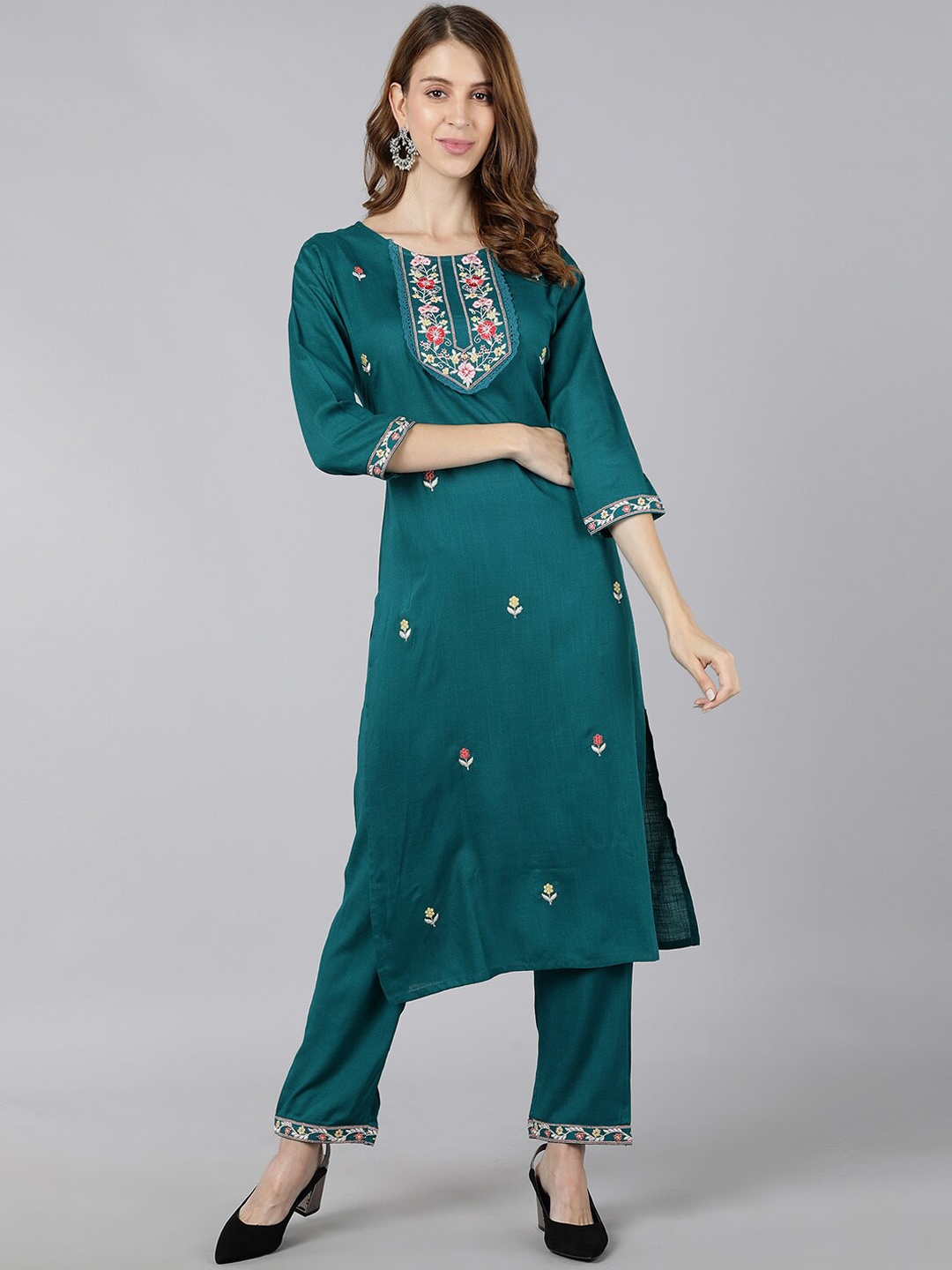 

kipek Women Turquoise Blue Ethnic Motifs Embroidered Kurta with Trousers