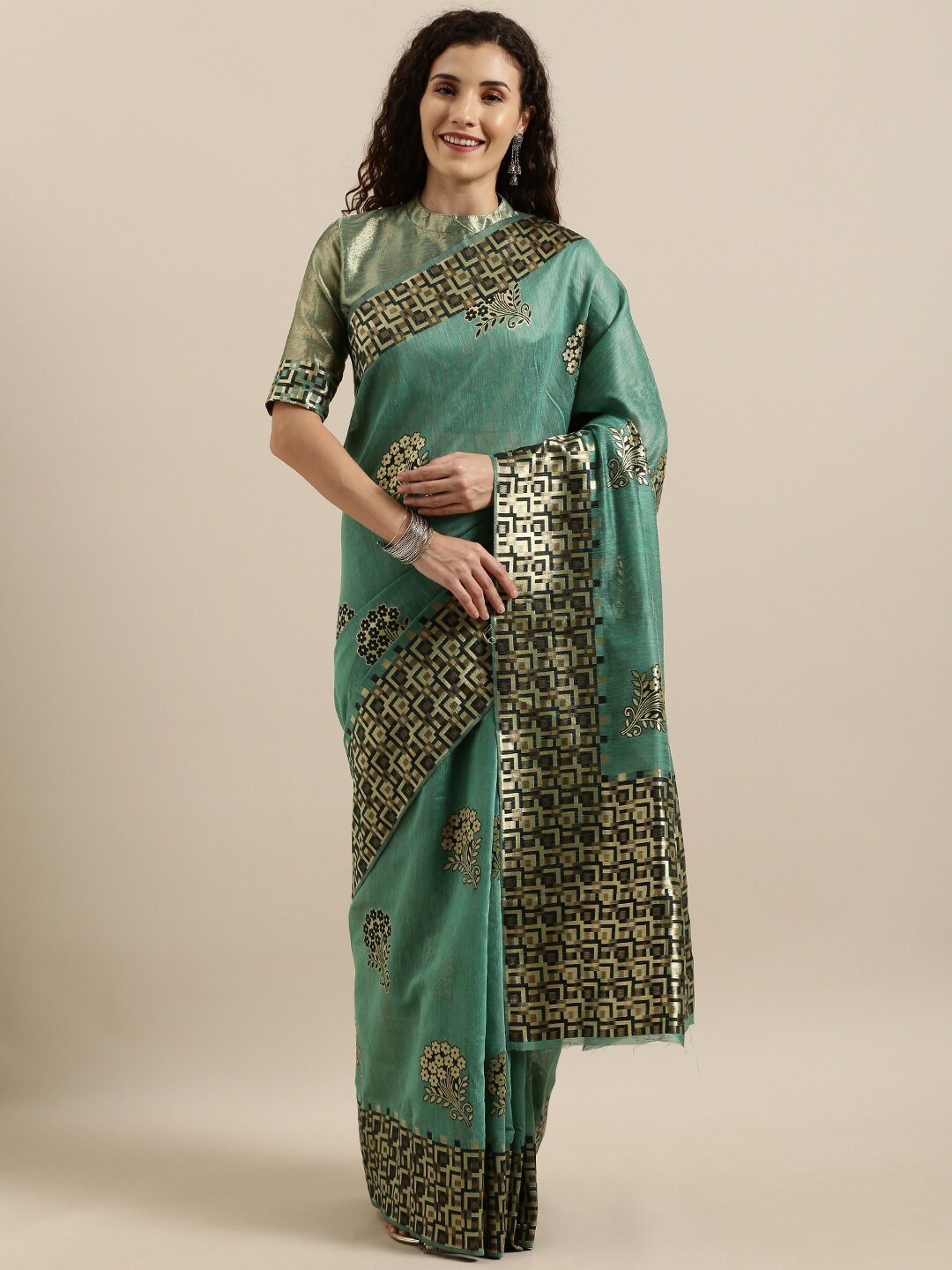 

SHAVYA Women Green Sarees