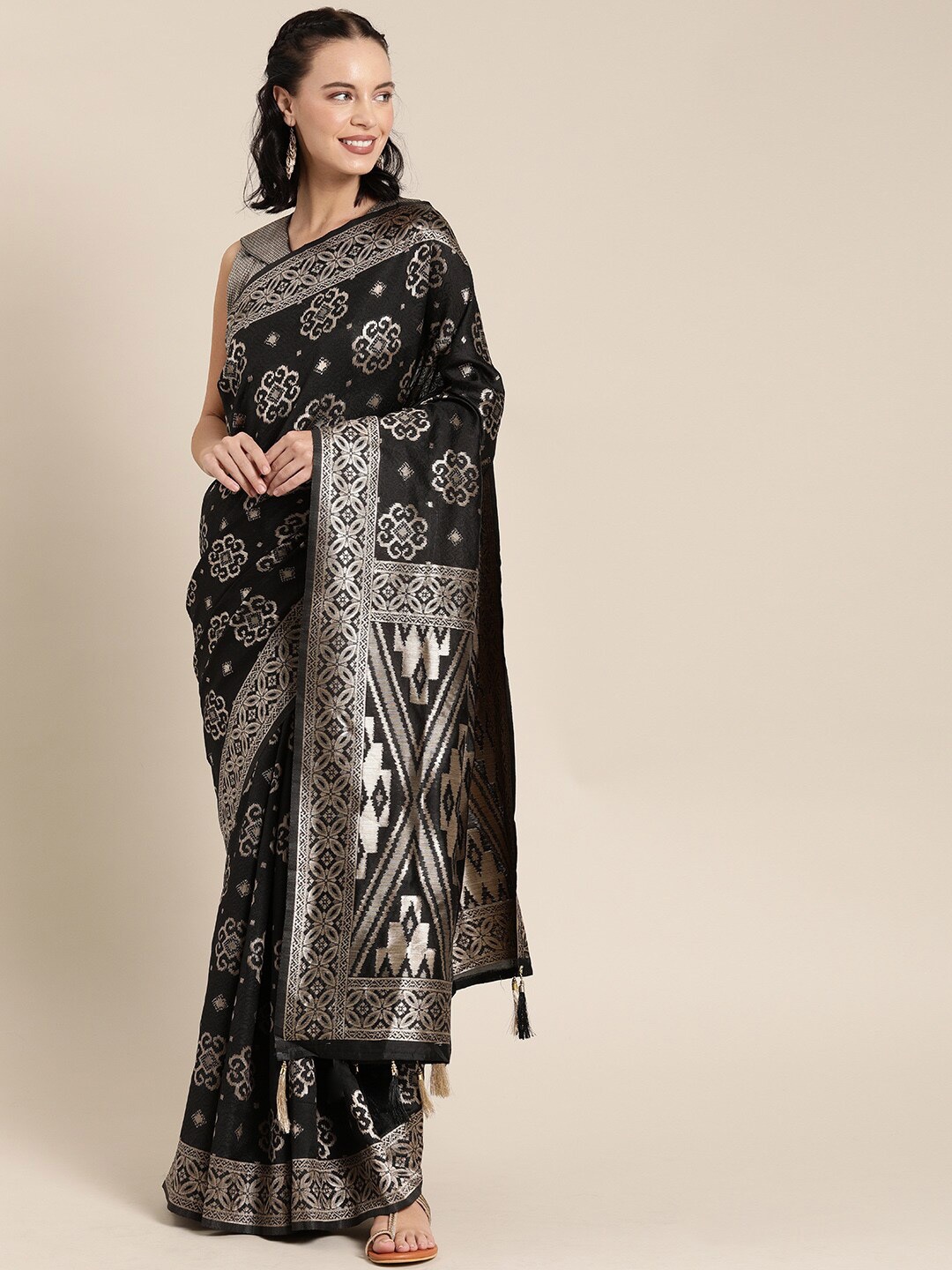 

SHAVYA Women Black Sarees