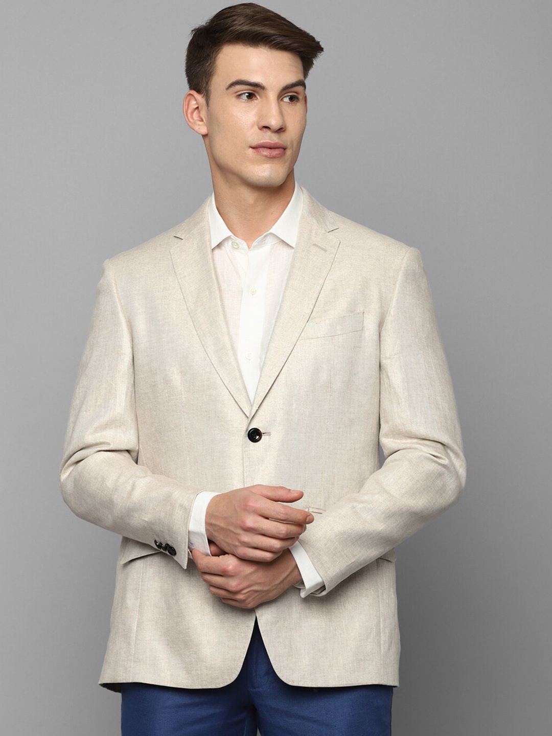 

Luxure by Louis Philippe Men Beige Solid Blazer