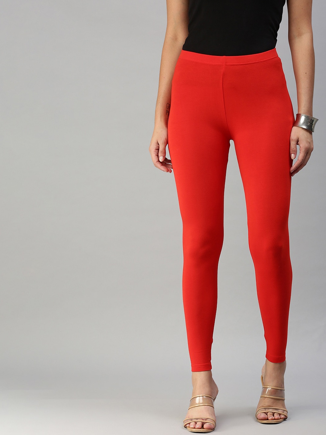 

De Moza Women Orange Solid Ankle-Length Leggings