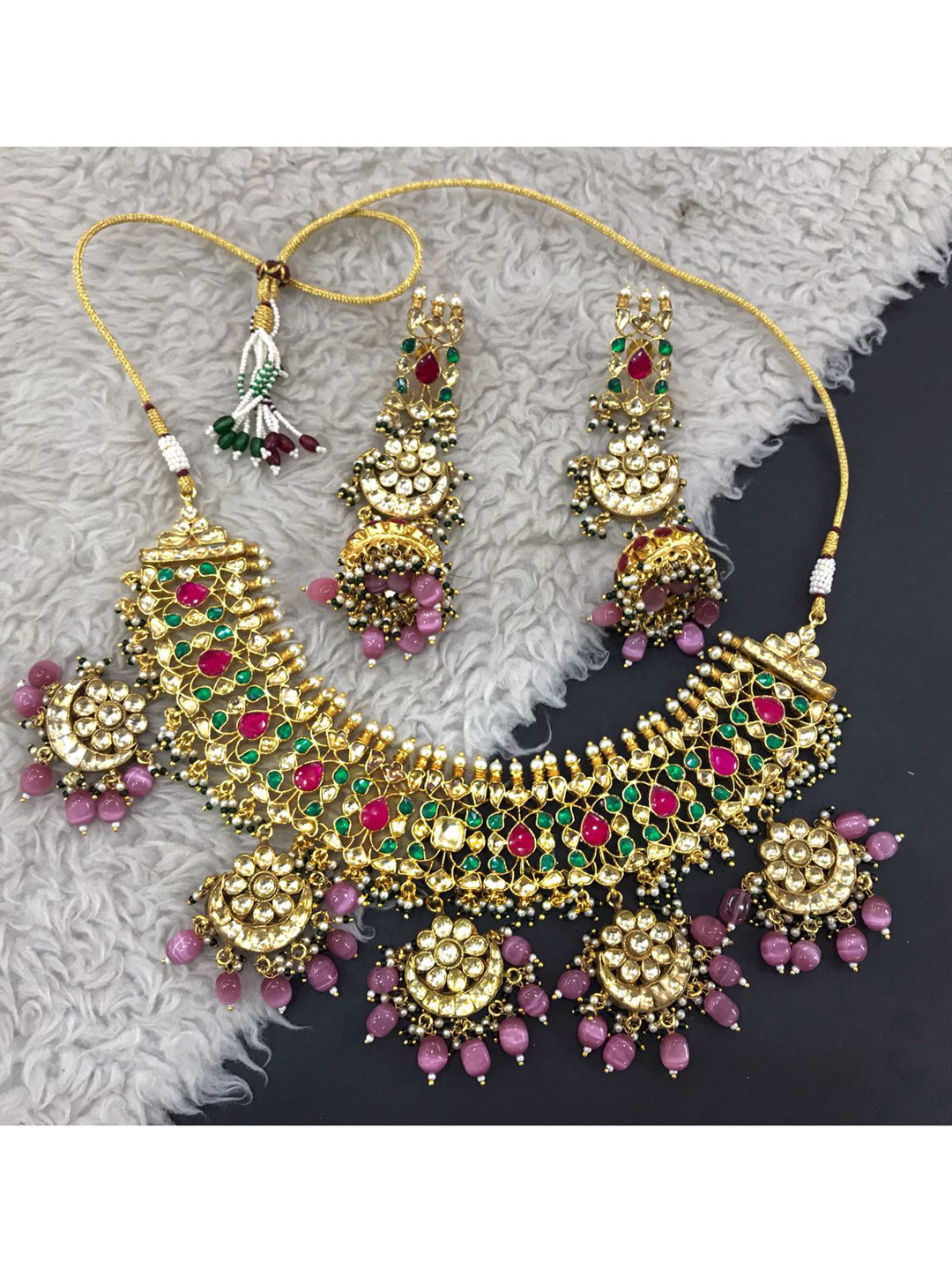 

SURYAM DESIGNER JEWELLERY Gold - Plated Pink and Green Colored White Kundan Studded Enameled Jewellery Set