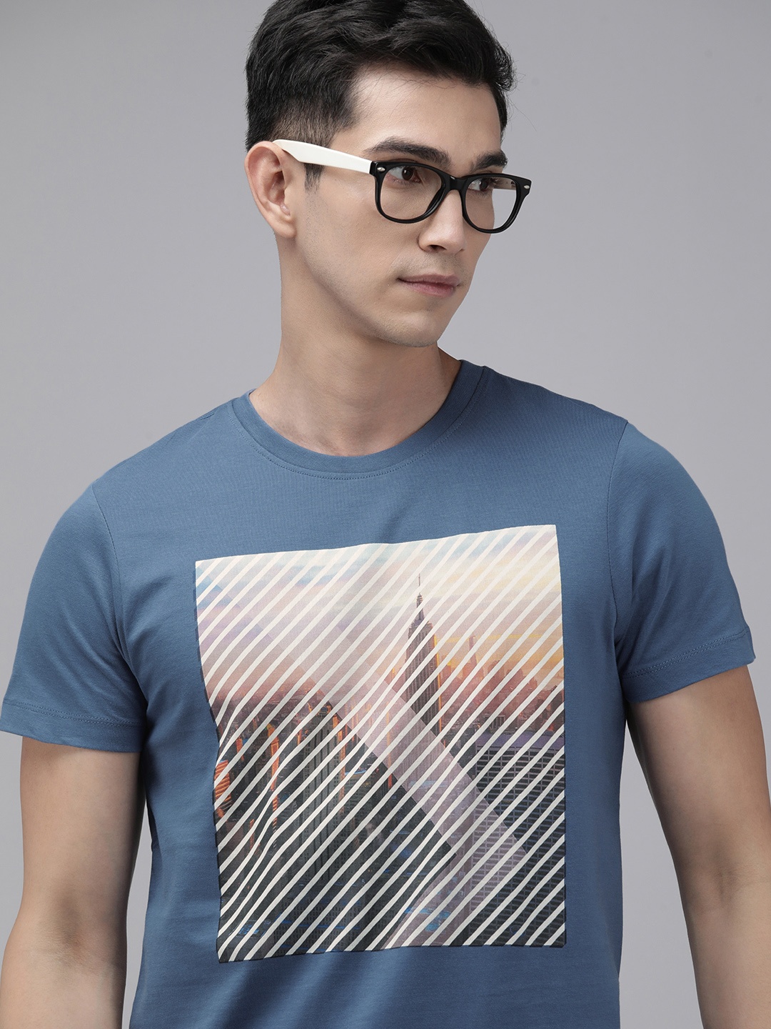 

Arrow New York Men Blue Printed Pure Cotton T-shirt