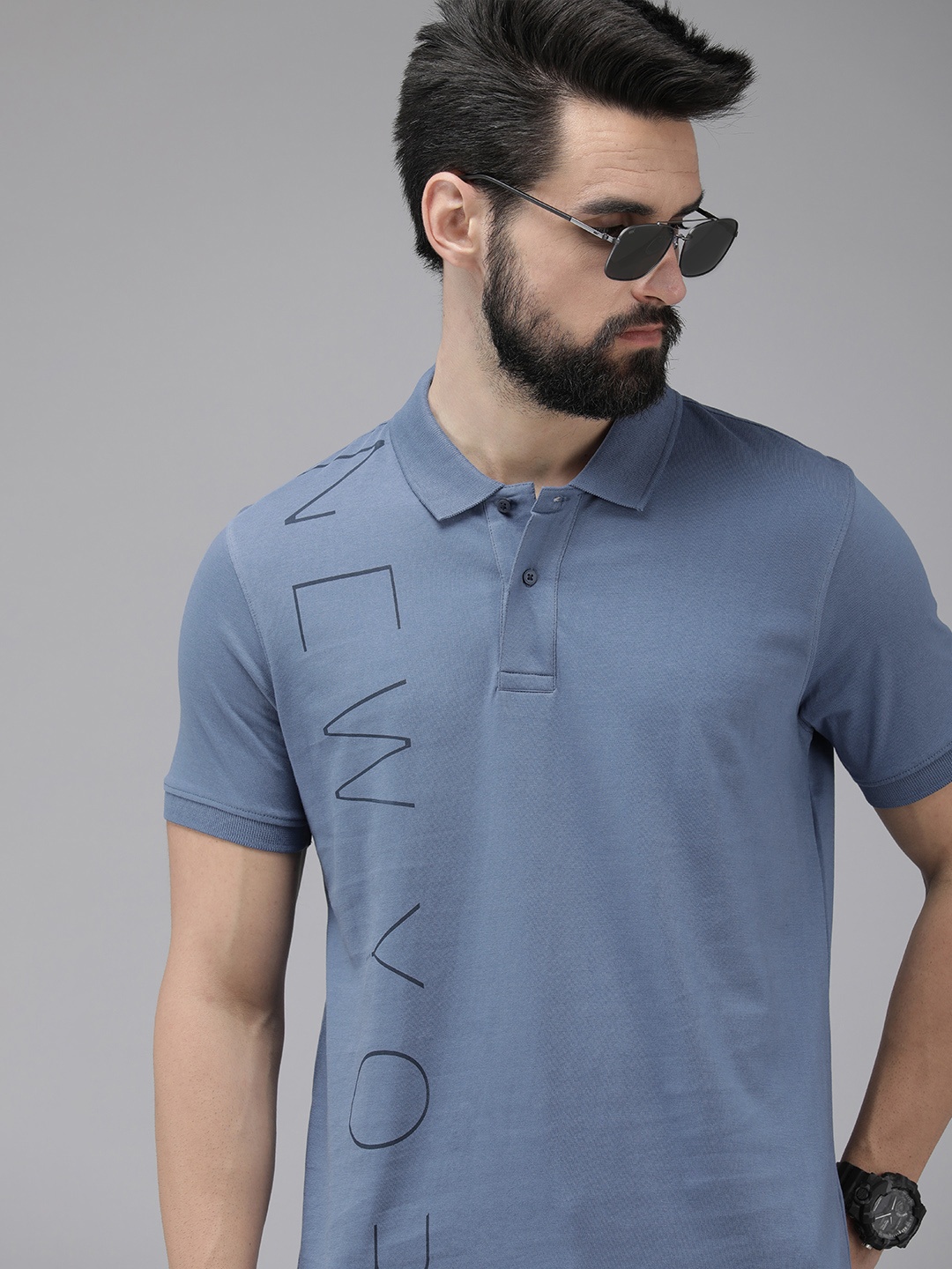 

Arrow New York Men Blue Brand Logo Printed Polo Collar Pure Cotton T-shirt