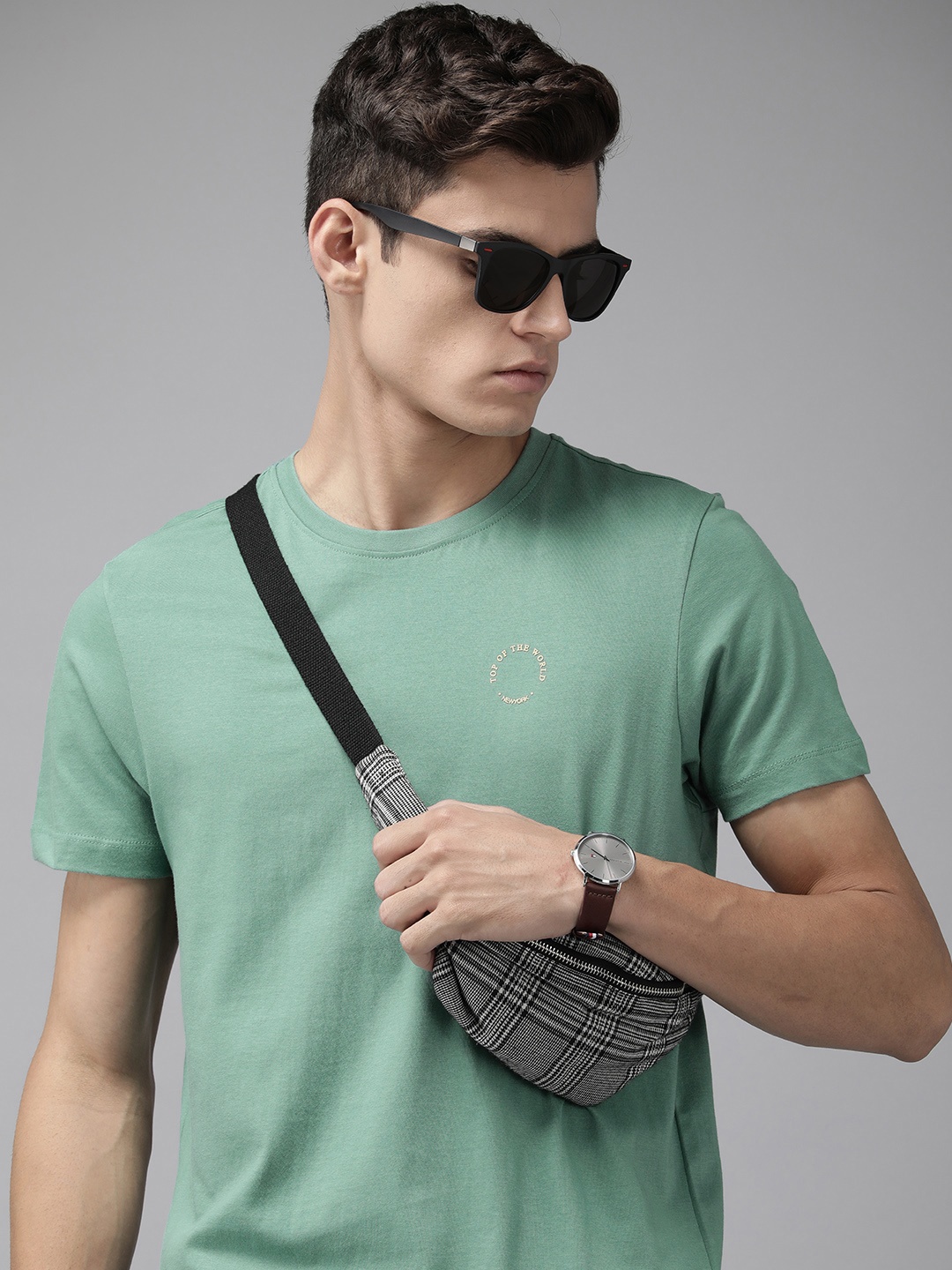 

Arrow New York Men Green Solid Pure Cotton T-shirt
