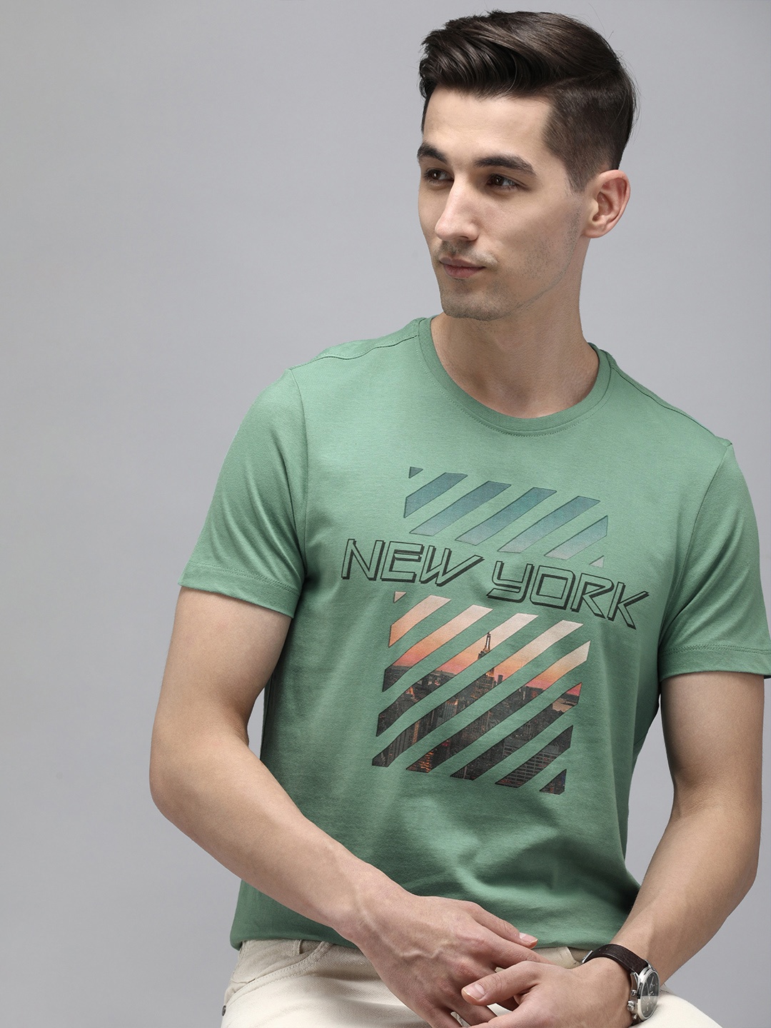 

Arrow New York Men Green Typography Printed Pure Cotton T-shirt