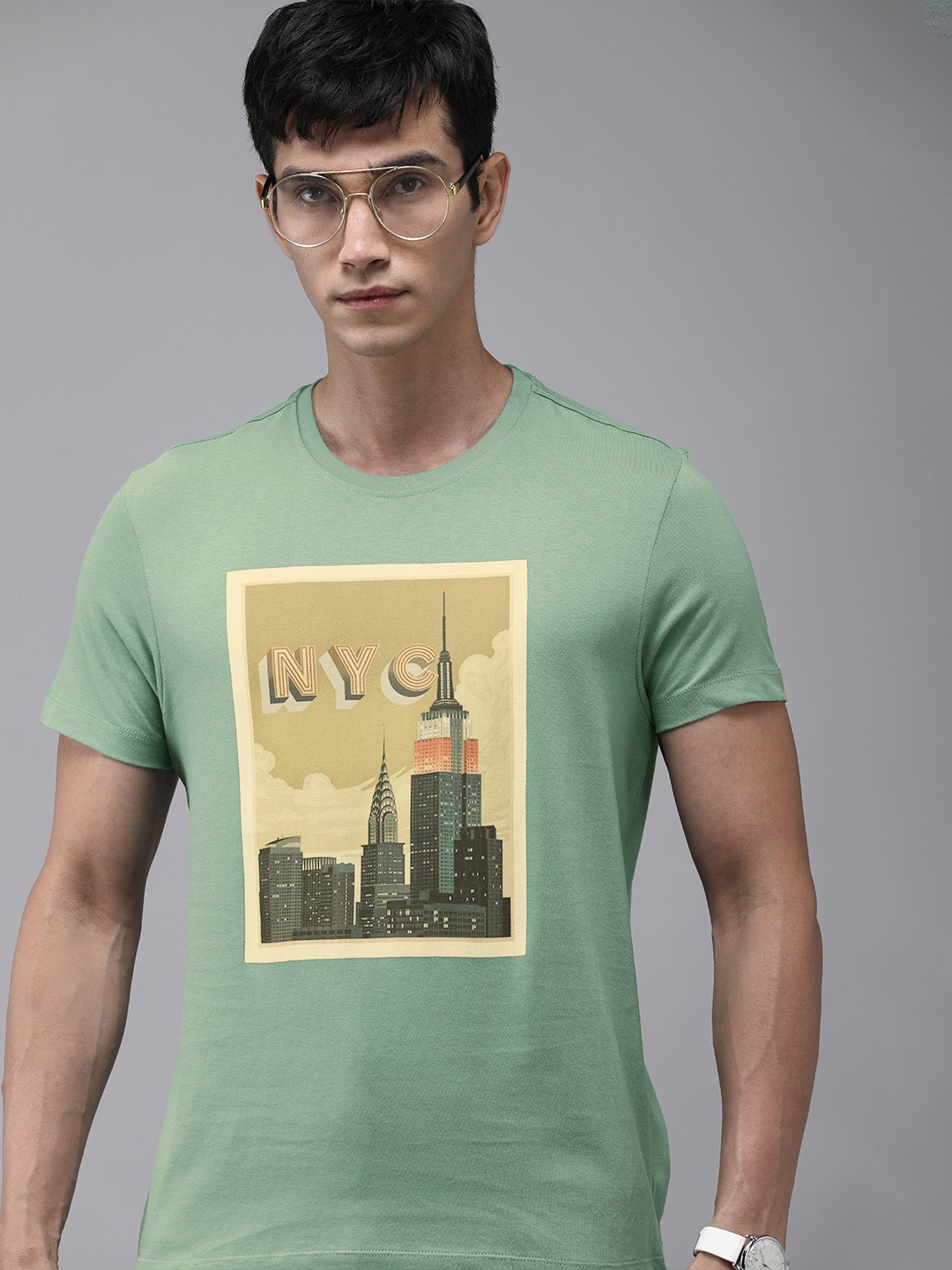 

Arrow New York Men Olive Green Graphic Printed Pure Cotton Casual T-shirt