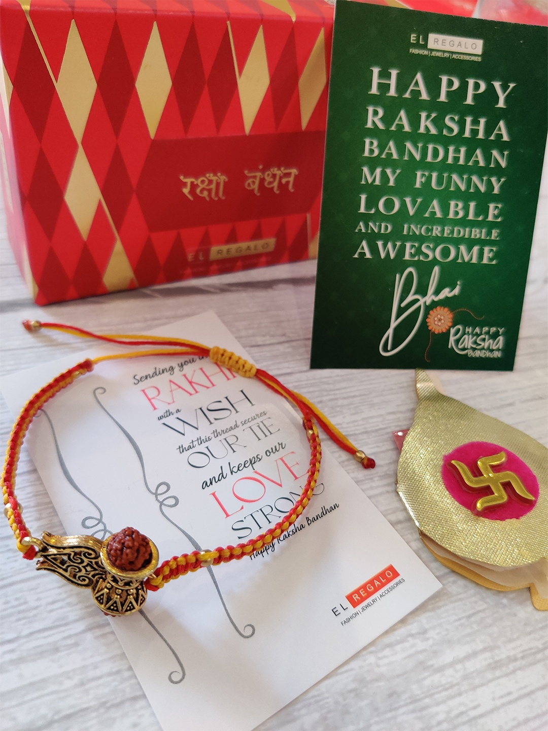 

EL REGALO Damru-Shaped Rakhi with Greeting Card, Roli Chawal, Gold