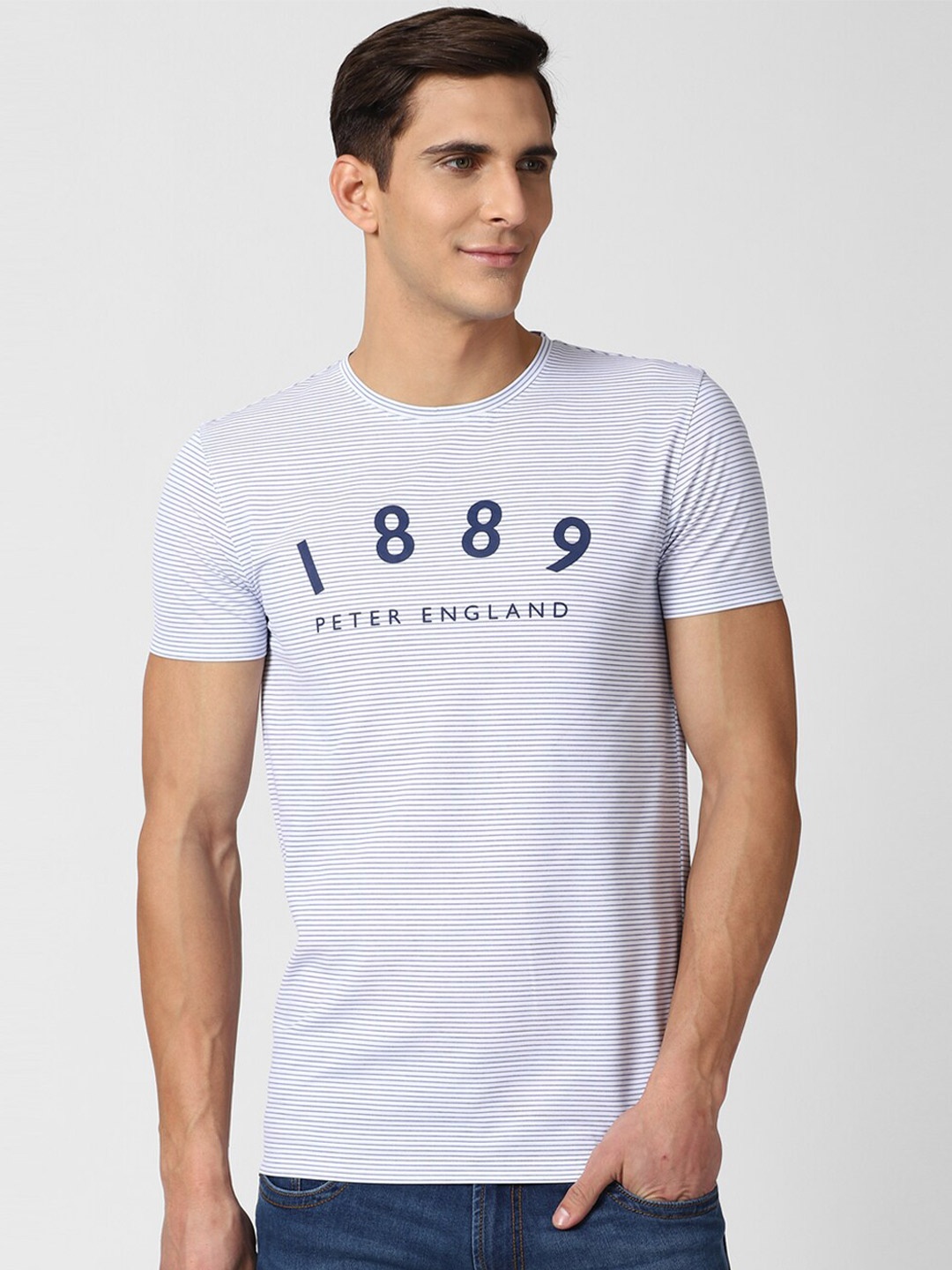 

Peter England Casuals Men White Typography Printed Applique Slim Fit T-shirt