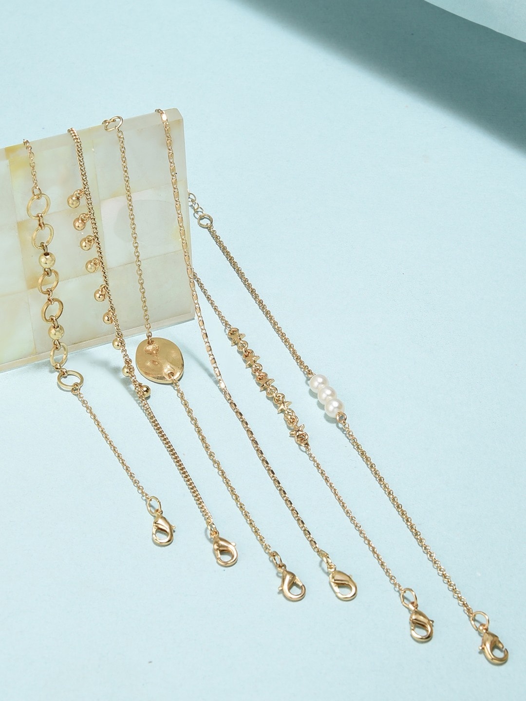 

AMI Women Set of 6 Gold Tone Contemporary Stackable Bracelets