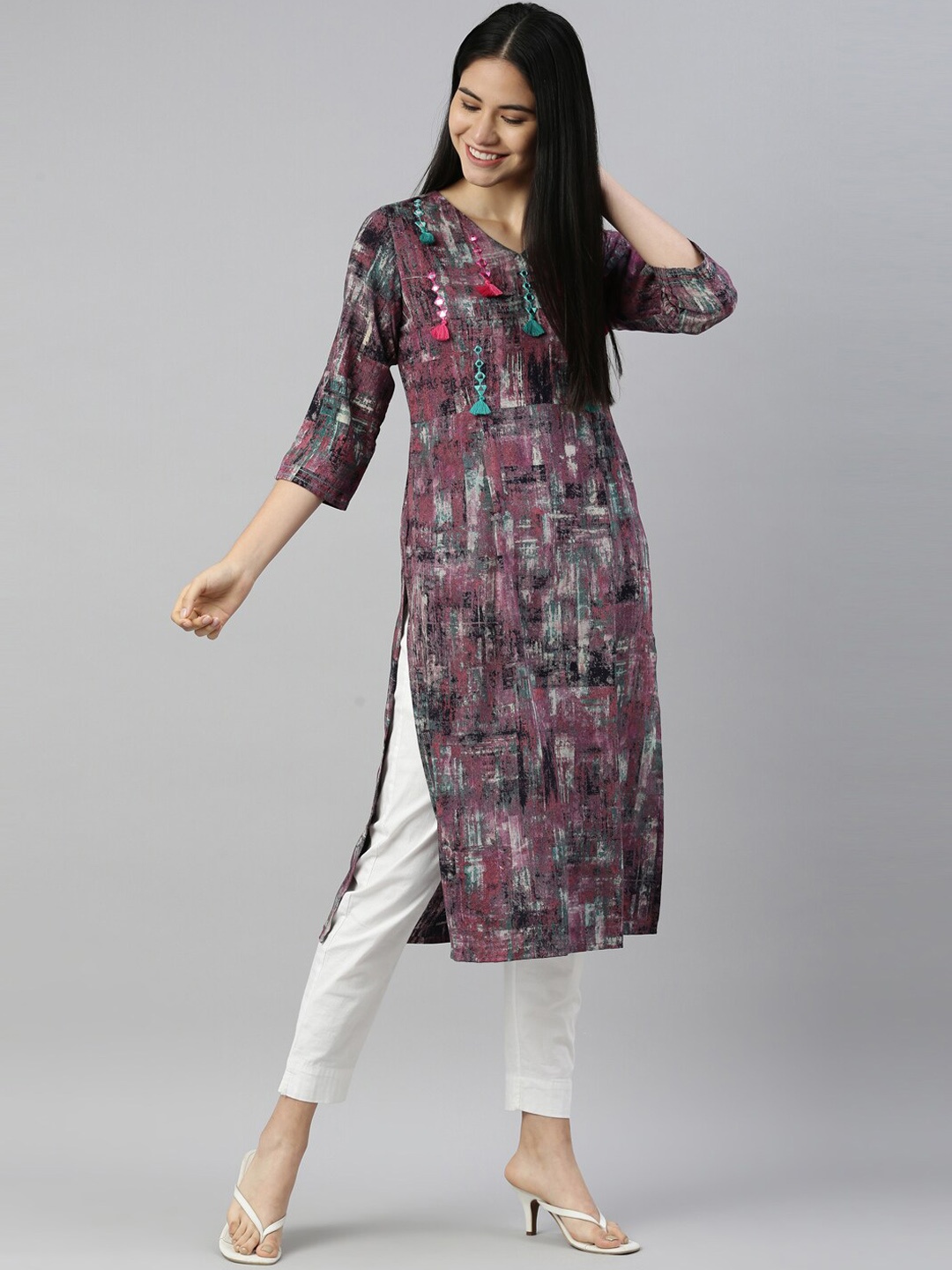 

Neerus Women Purple Printed Tassels and Thread work Kurta