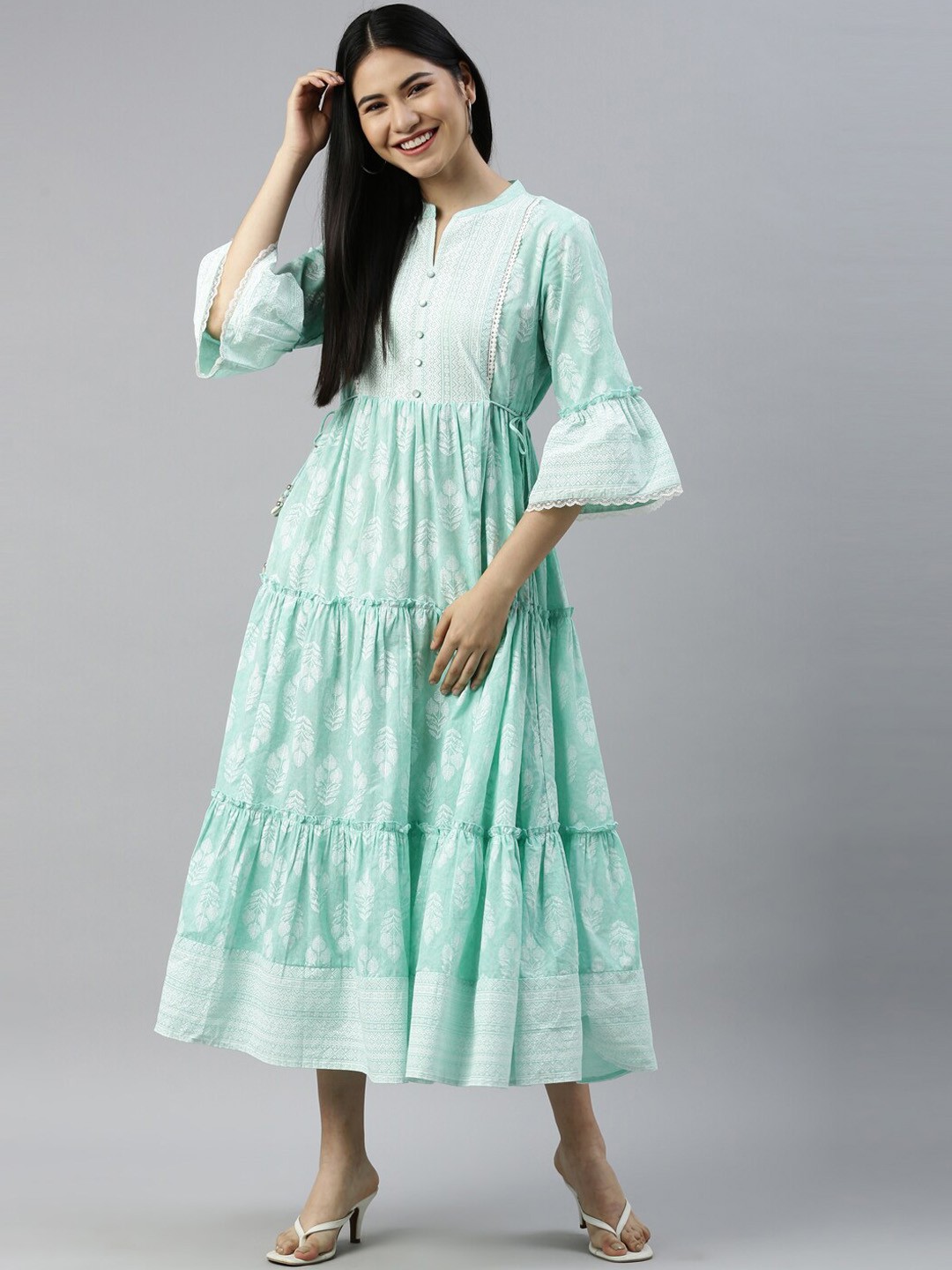 

Neerus Women Sea Green Striped Keyhole Neck Flared Sleeves Gotta Patti Anarkali Kurta