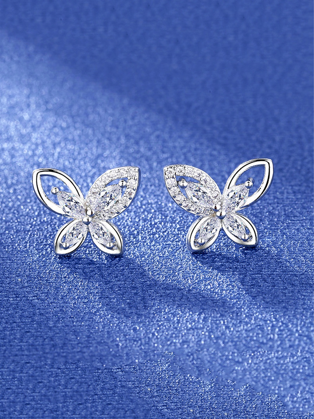 

Unwind by Yellow Chimes Silver-Toned Contemporary Studs Earrings