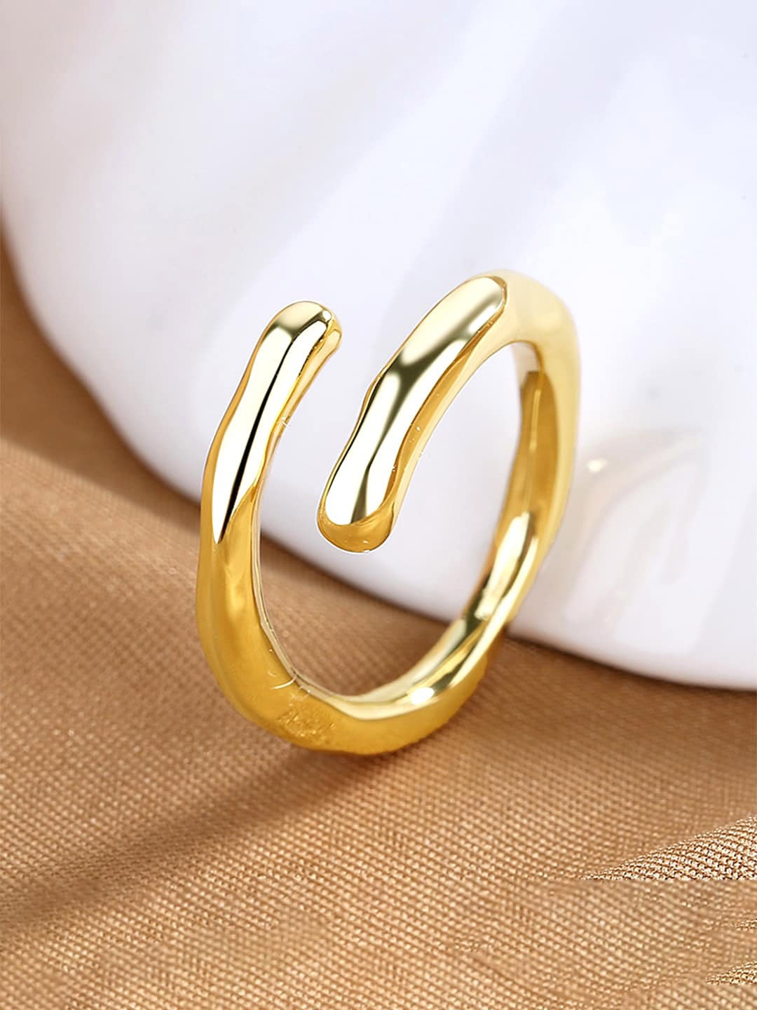 

Unwind by Yellow Chimes Gold-Plated Adjustable Finger Ring
