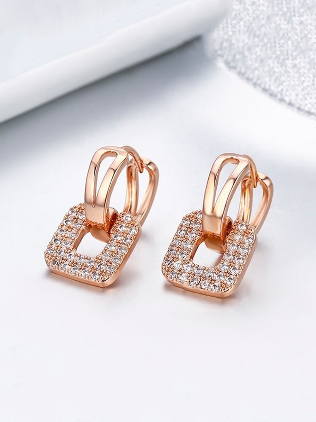

Unwind by Yellow Chimes Rose Gold Contemporary Studs Earrings