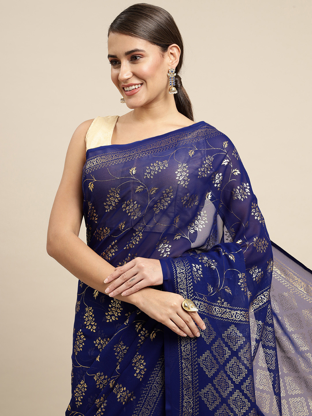 

KALINI Women Blue & Silver-Toned Ethnic Motifs Saree