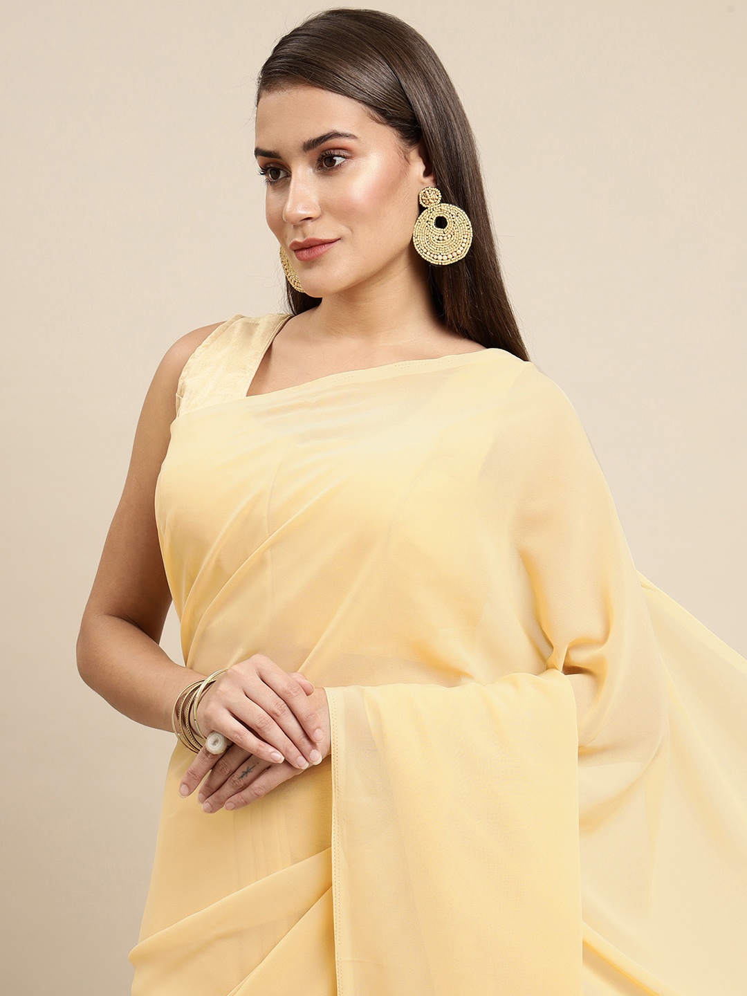 

KALINI Women Cream-Coloured Solid Saree