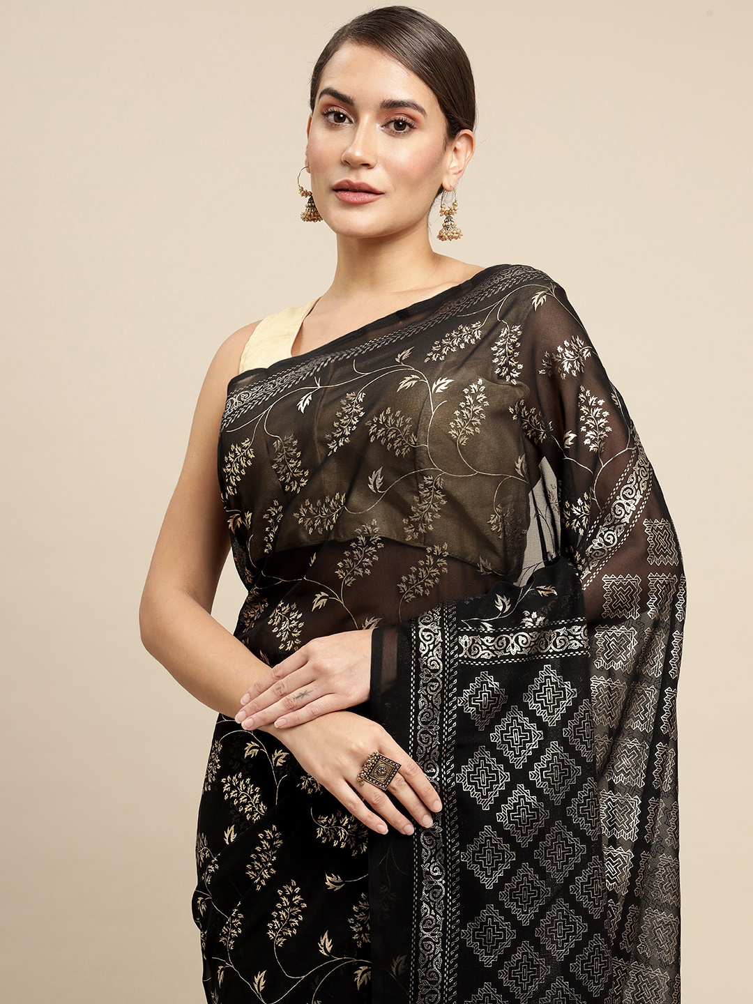 

KALINI Women Black & Silver-Toned Ethnic Motifs Saree