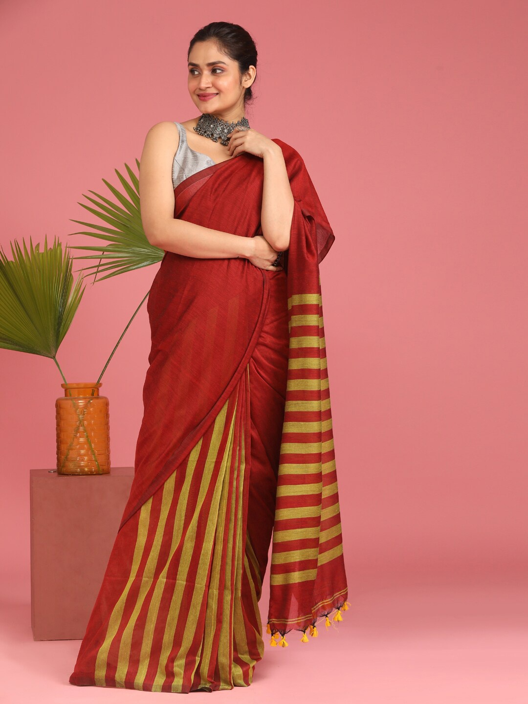 

Indethnic Red & Green Striped Half and Half Jamdani Saree