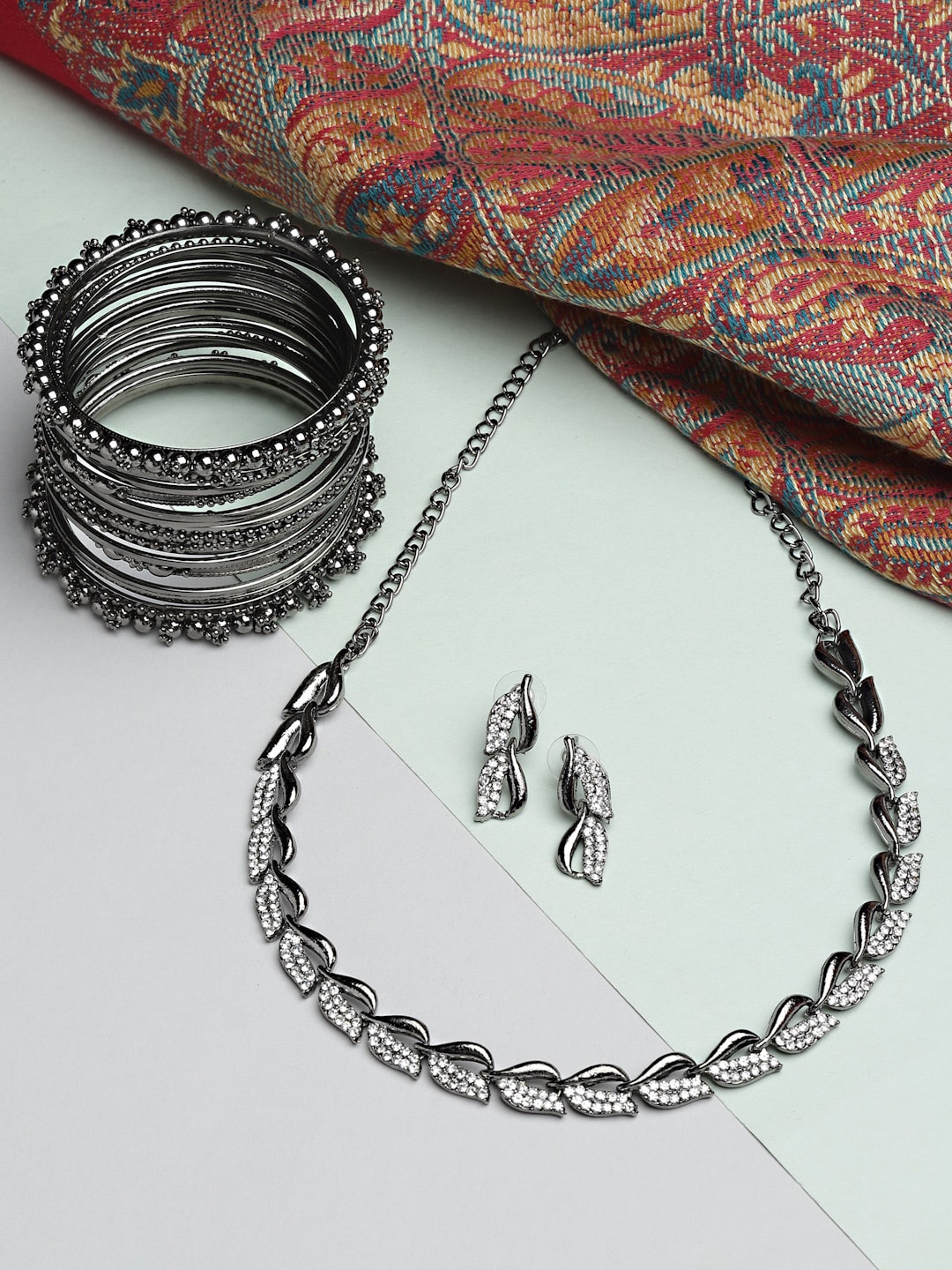 

ZENEME Women Black & Silver-Toned Oxidised Silver Plated CZ Stone Studded Jewellery Set