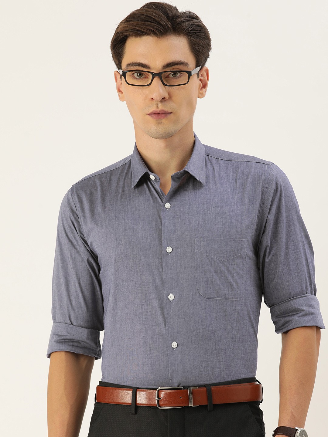 

Peter England Men Blue Solid Slim Fit Casual Shirt