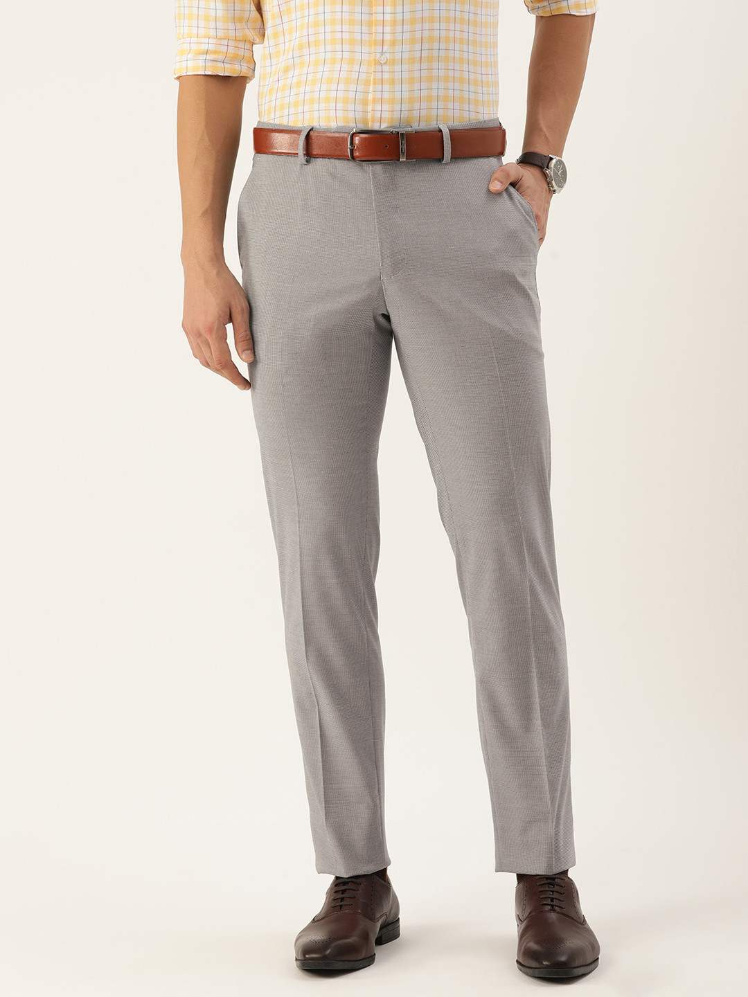 

Peter England Men White Textured Slim Fit Trousers
