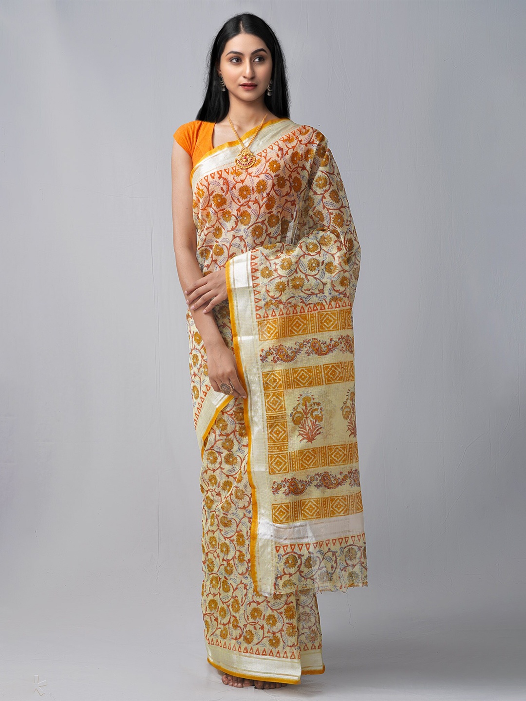 

Unnati Silks Yellow & Rust Floral Pure Cotton Block Print Saree