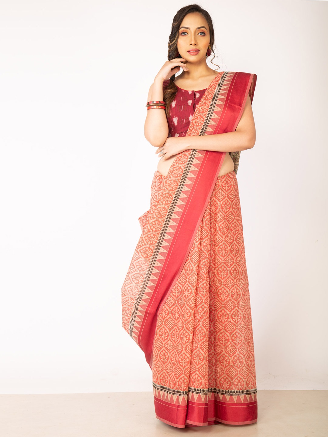 

Unnati Silks Red & Green Ethnic Motifs Silk Cotton Chanderi Saree