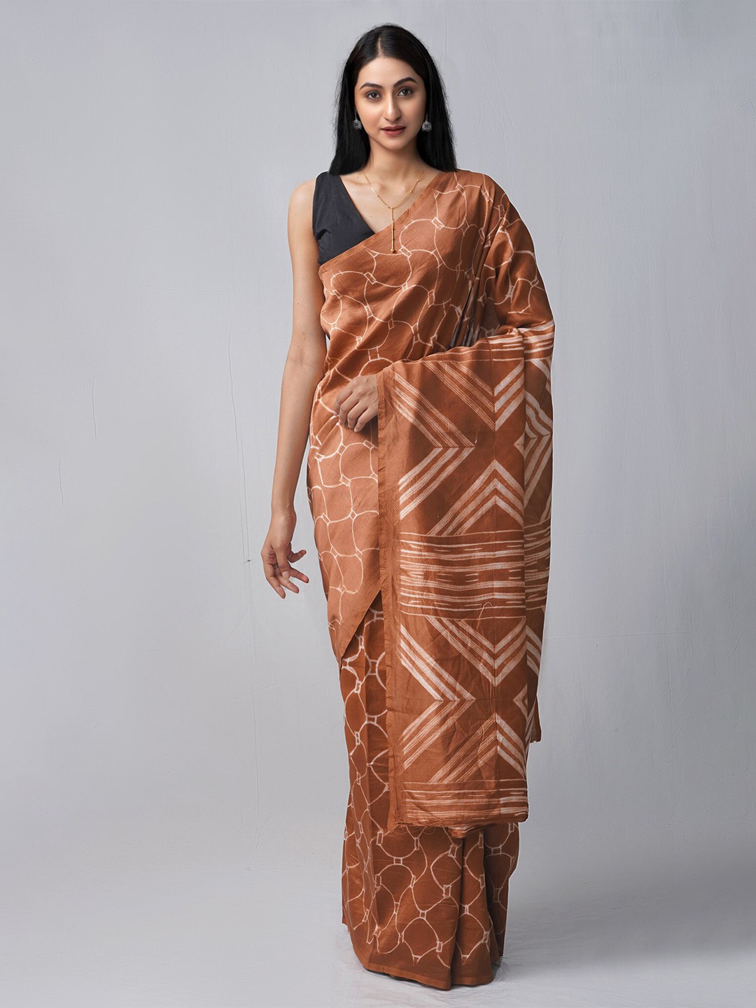 

Unnati Silks Brown & White Leheriya Silk Cotton Chanderi Saree