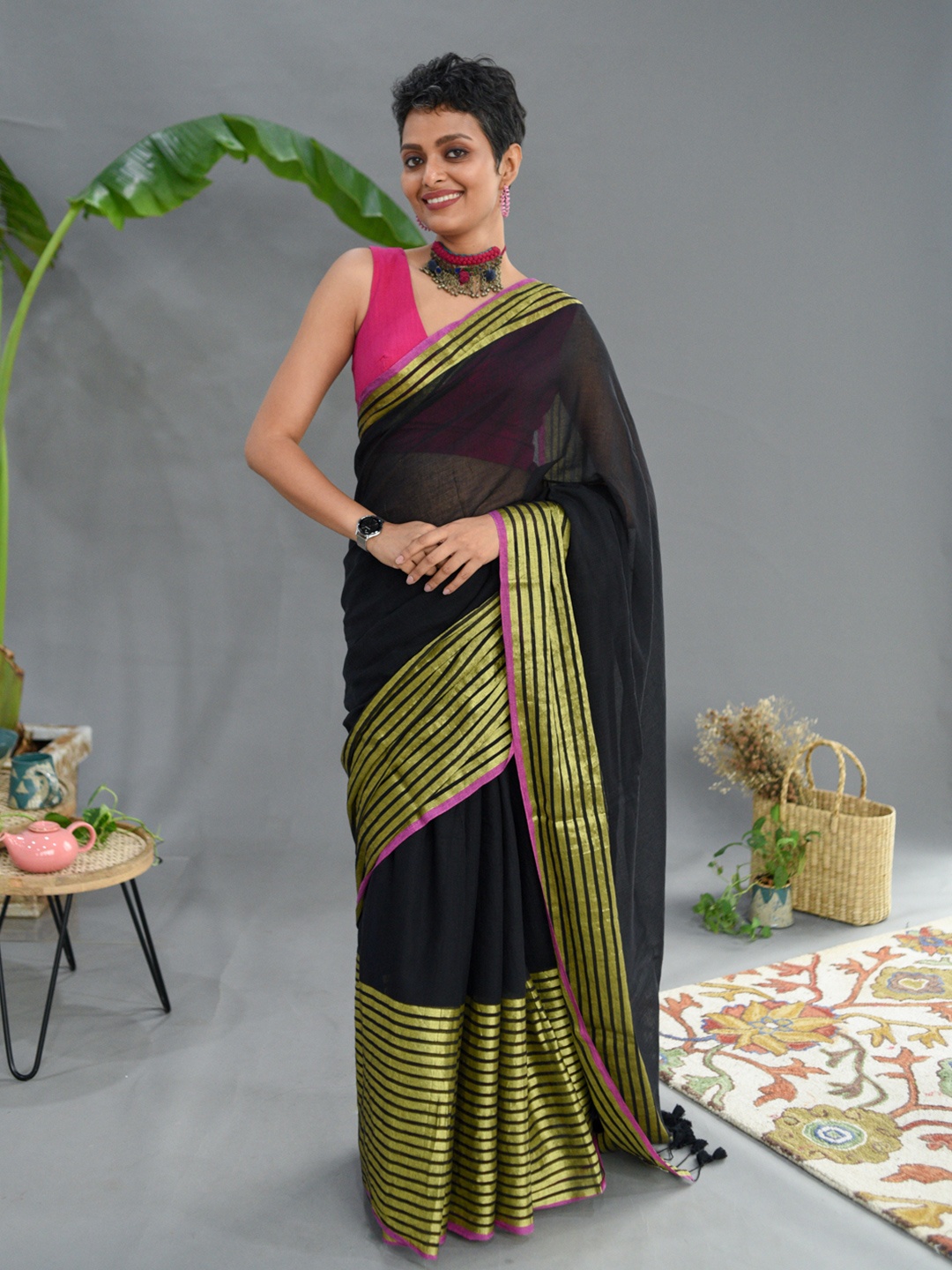 

Suta Black Woven Design Saree