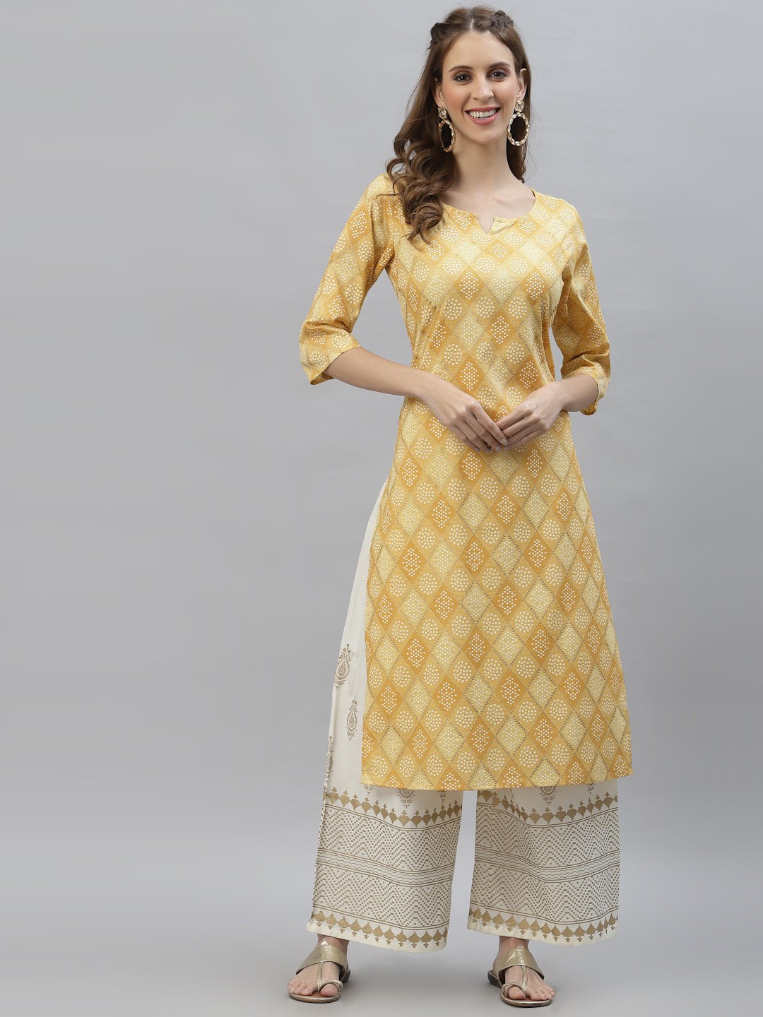 

Stylum Women Yellow Ethnic Motifs Printed Thread Work Pastels Kurta