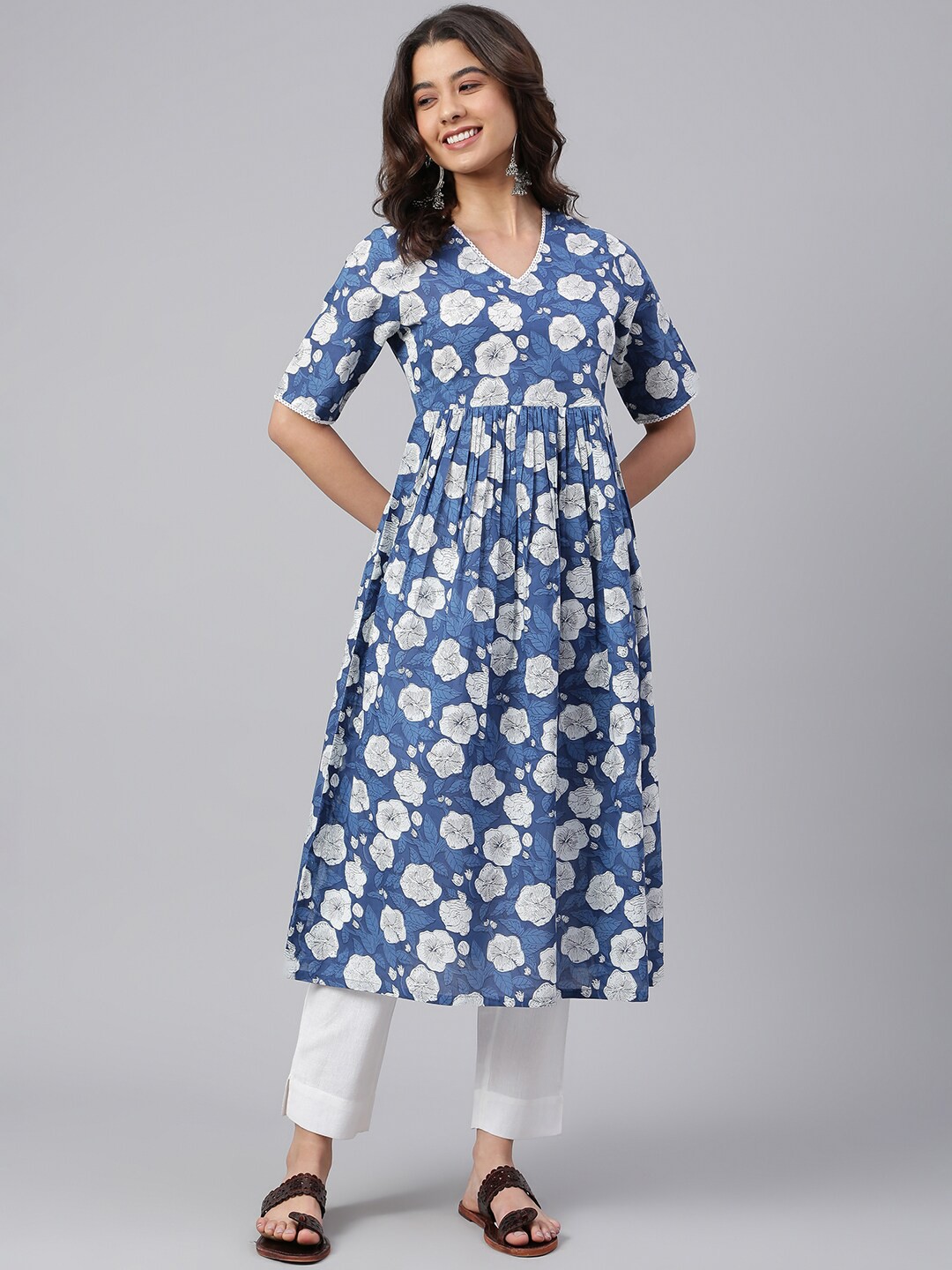 

Janasya Women Dark Blue Cotton Floral Print Flared Kurta