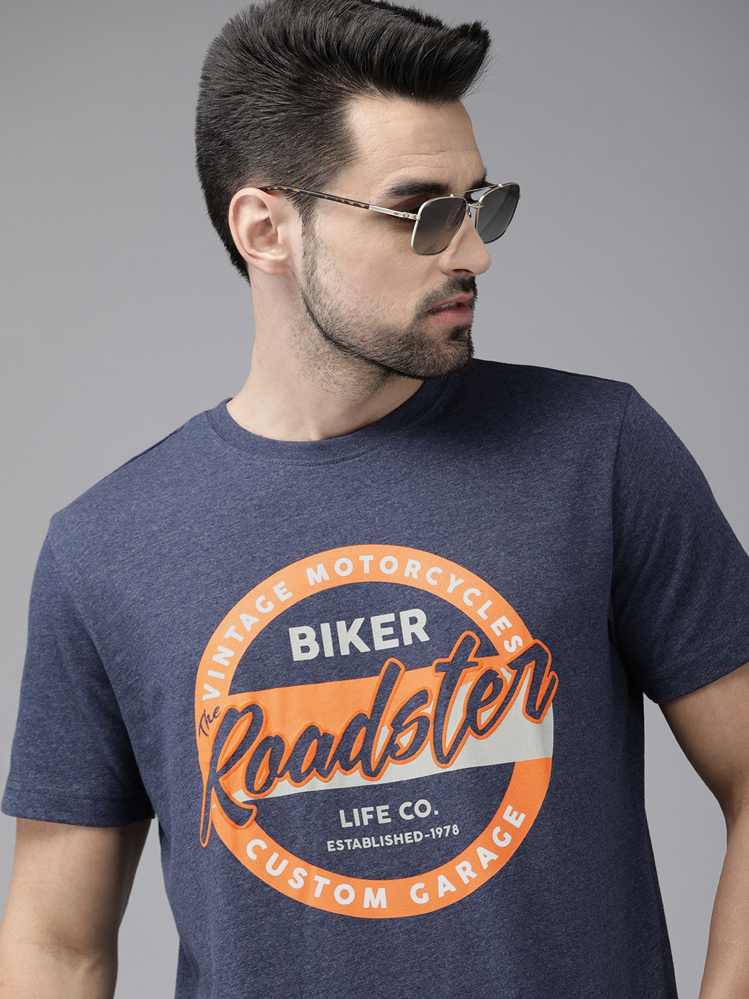 

Roadster Men Navy Blue & Orange Brand Logo Printed Cotton T-shirt