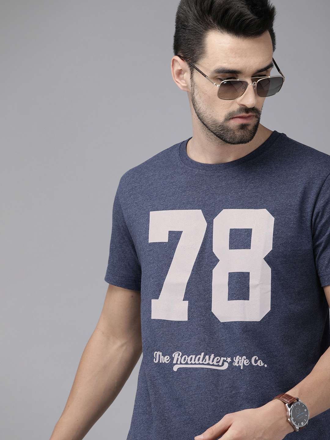 

Roadster Men Navy Blue & Beige Brand Logo Printed Cotton T-shirt