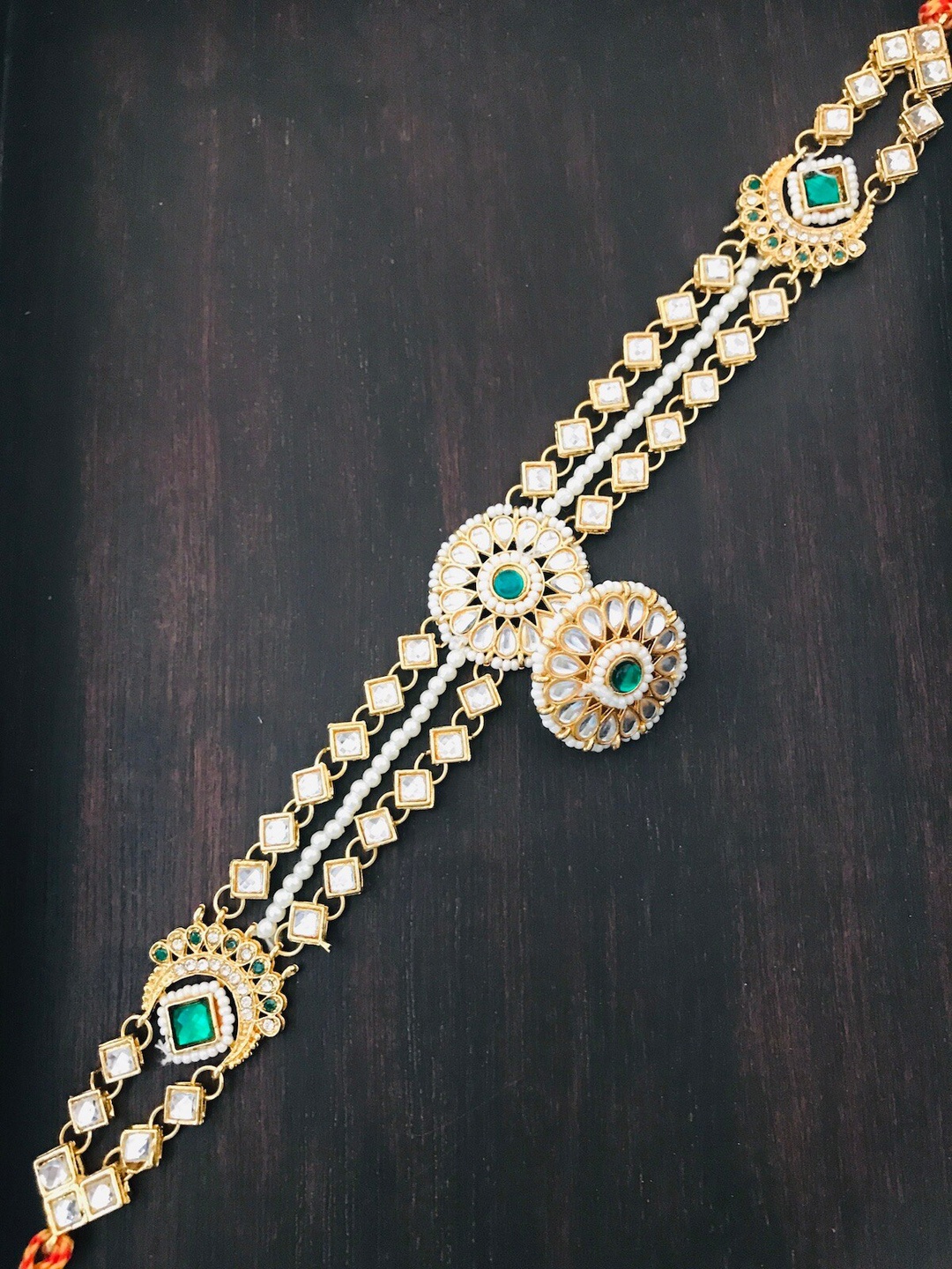 

The Opal Factory Gold-Plated & White Kundan-Studded & Pearls Beaded Sheeshphool Mathapatti