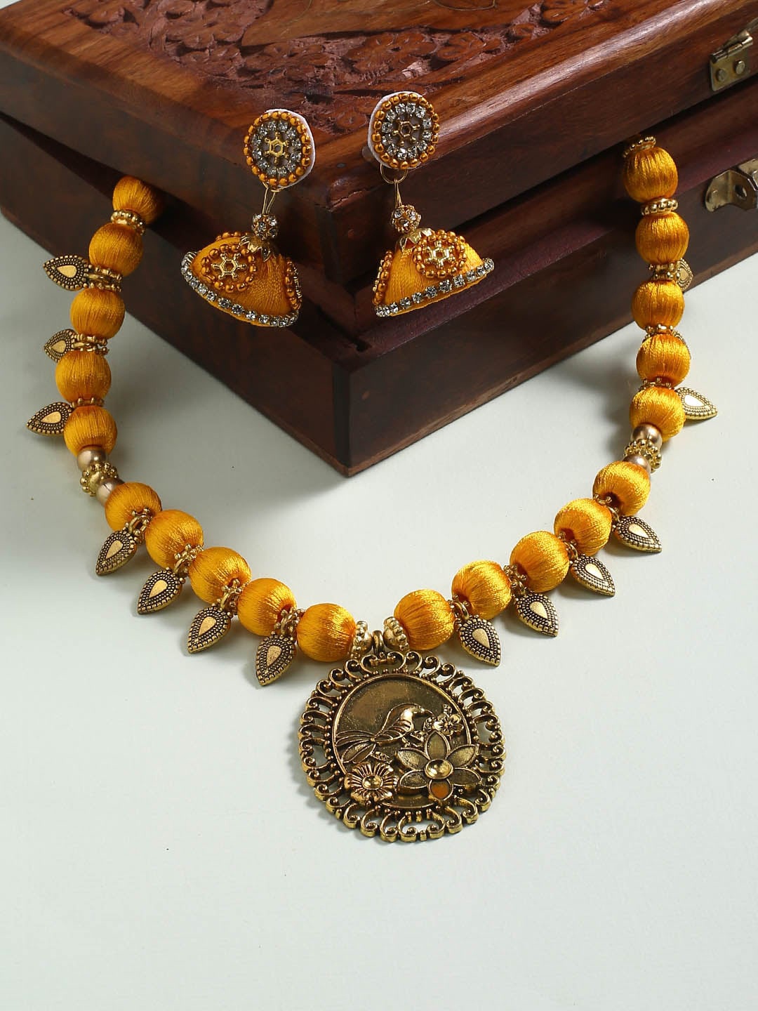 

AKSHARA Gold Toned Brass Plated German Silver Jewellery Set