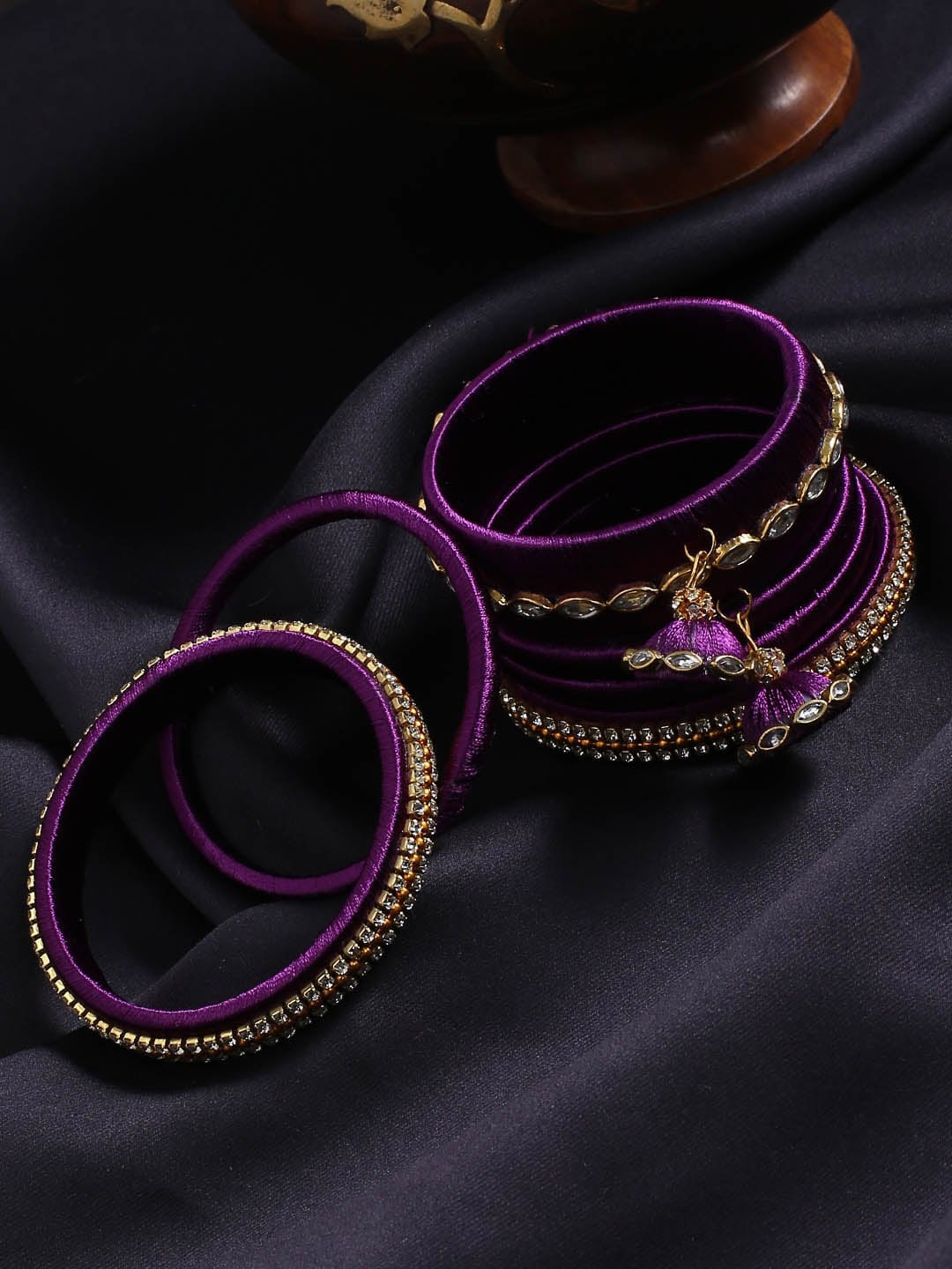 

AKSHARA Set Of 14 Gold-Plated & Purple Stone-Studded & Beaded Bridal Bangles