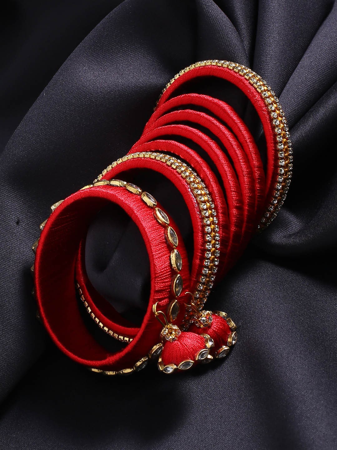 

AKSHARA Set Of 14 Gold-Plated Red & White Stone Studded & Beaded Handcrafted Bangles