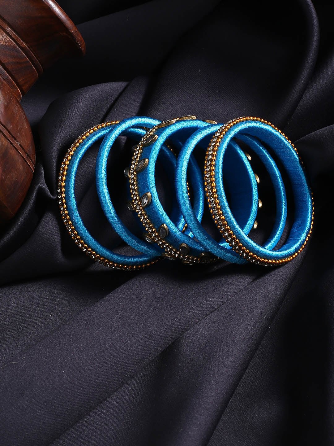 

AKSHARA Set of 10 Gold-Plated White & Blue Stone Studded & Beaded Handcrafted Bangles