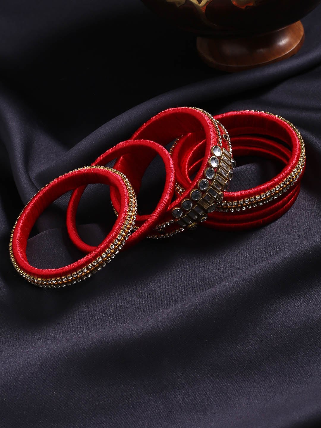 

AKSHARA Set Of 14 Gold-Plated Red Stone Studded Handcrafted Bangle