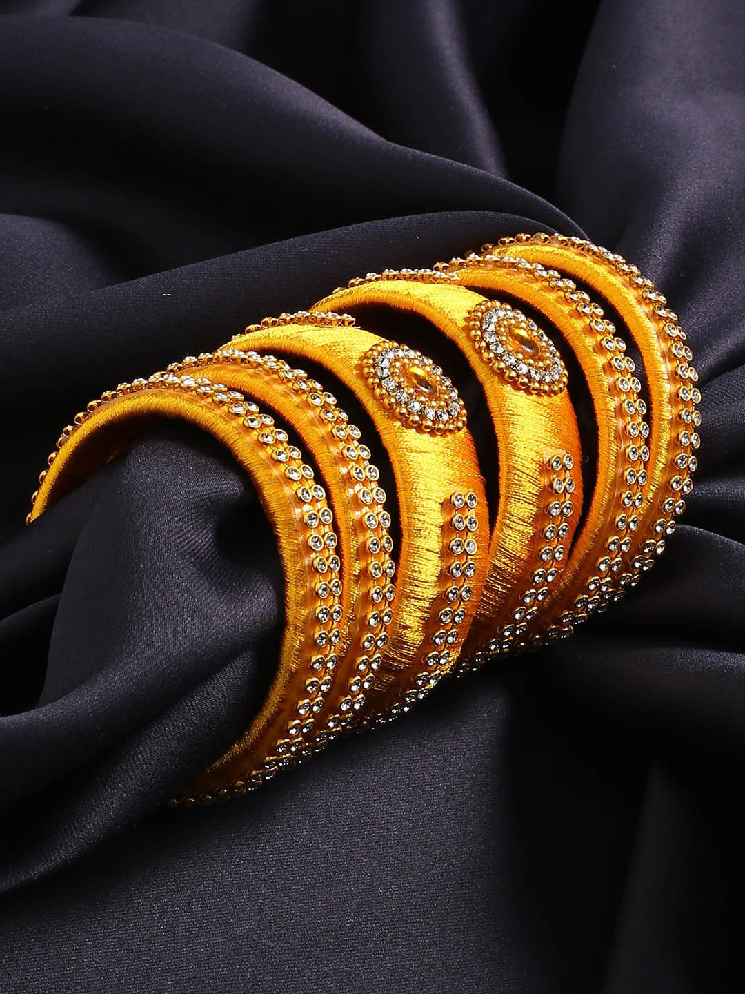 

AKSHARA Set Of 6 Gold-Plated & Yellow Stone-Studded & Beaded Bridal Bangles