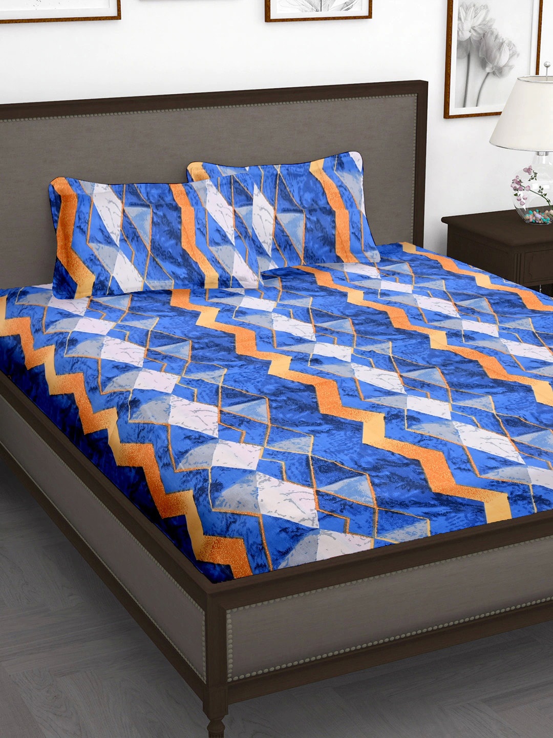 

Cortina Blue & Orange Geometric 104 TC Cotton Queen Bedsheet with 2 Pillow Covers