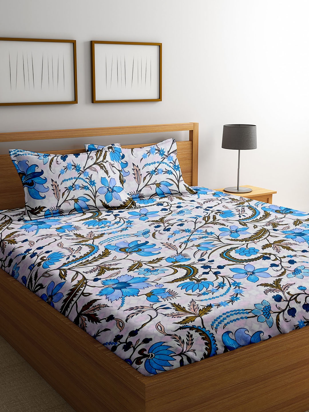 

Cortina White & Blue Ethnic Motifs 104 TC Queen Bedsheet with 2 Pillow Covers